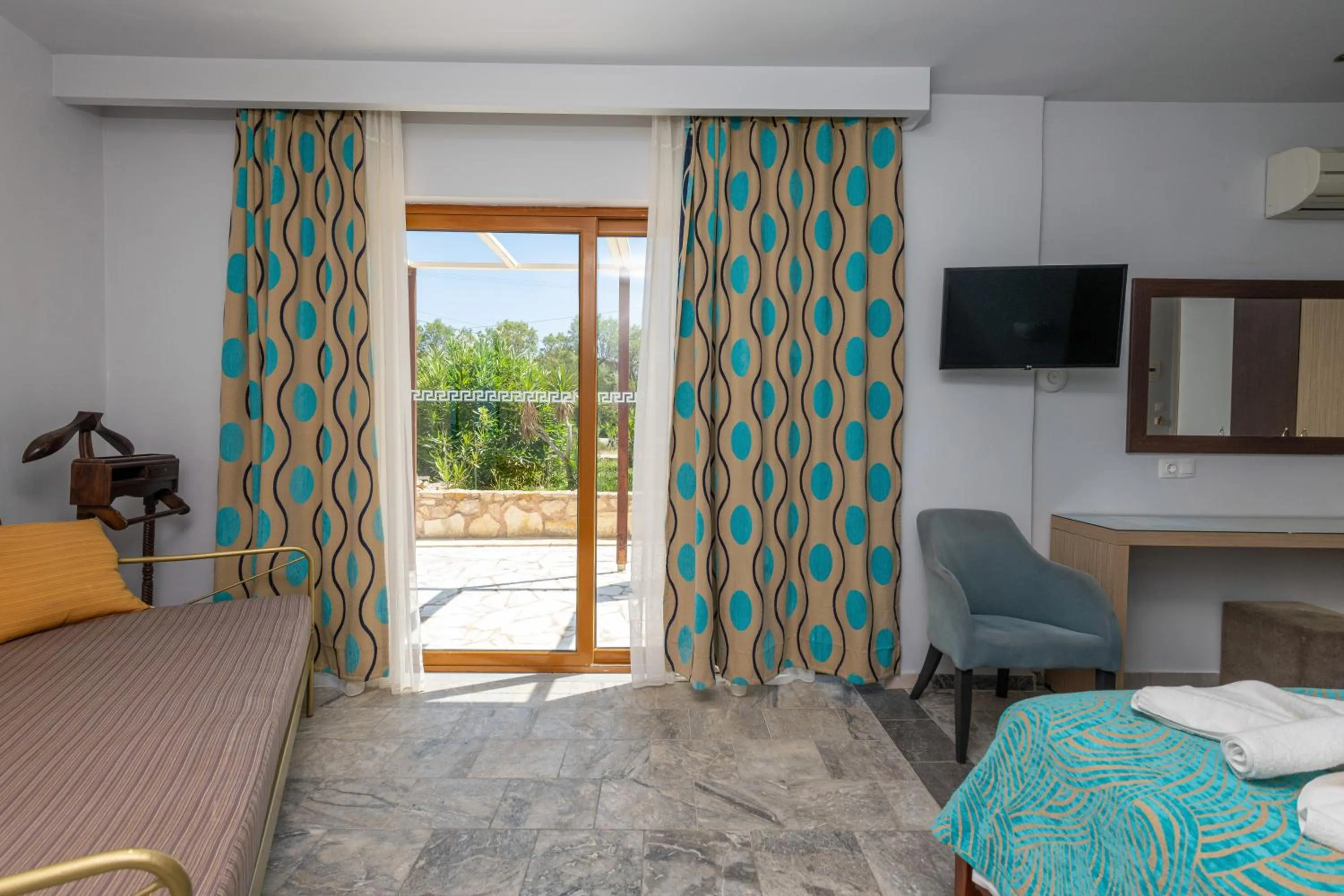 Seating area, Bed in Musela Studios