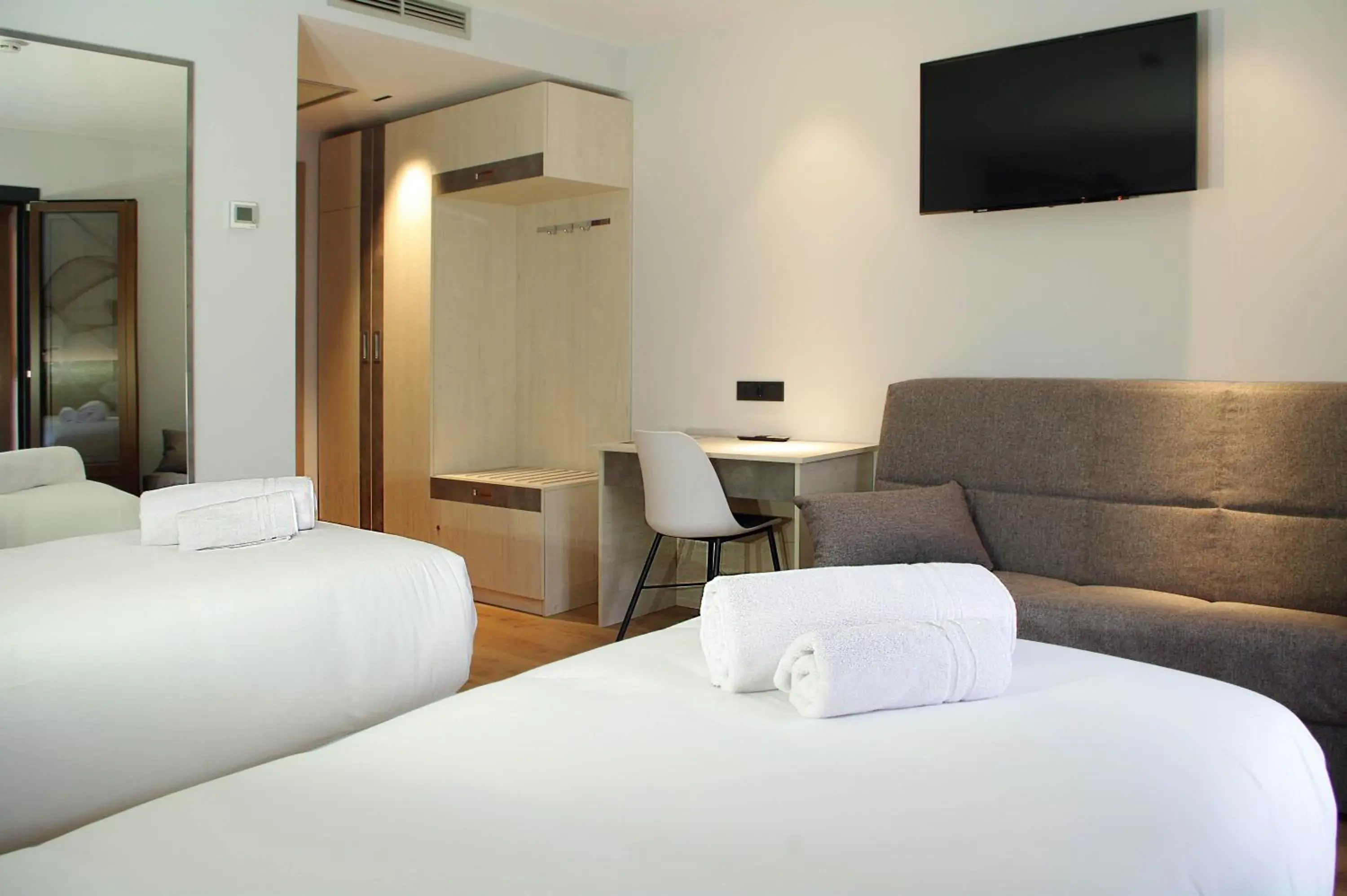 Communal lounge/ TV room, Bed in Hotel NERU con Encanto Communal lounge/ TV room, Bed in Hotel NERU con Encanto