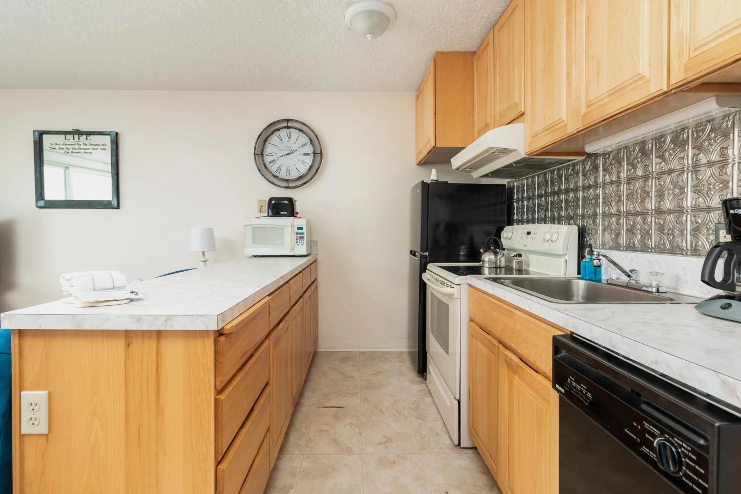 Kitchen or kitchenette in Ocean Terrace Condominiums