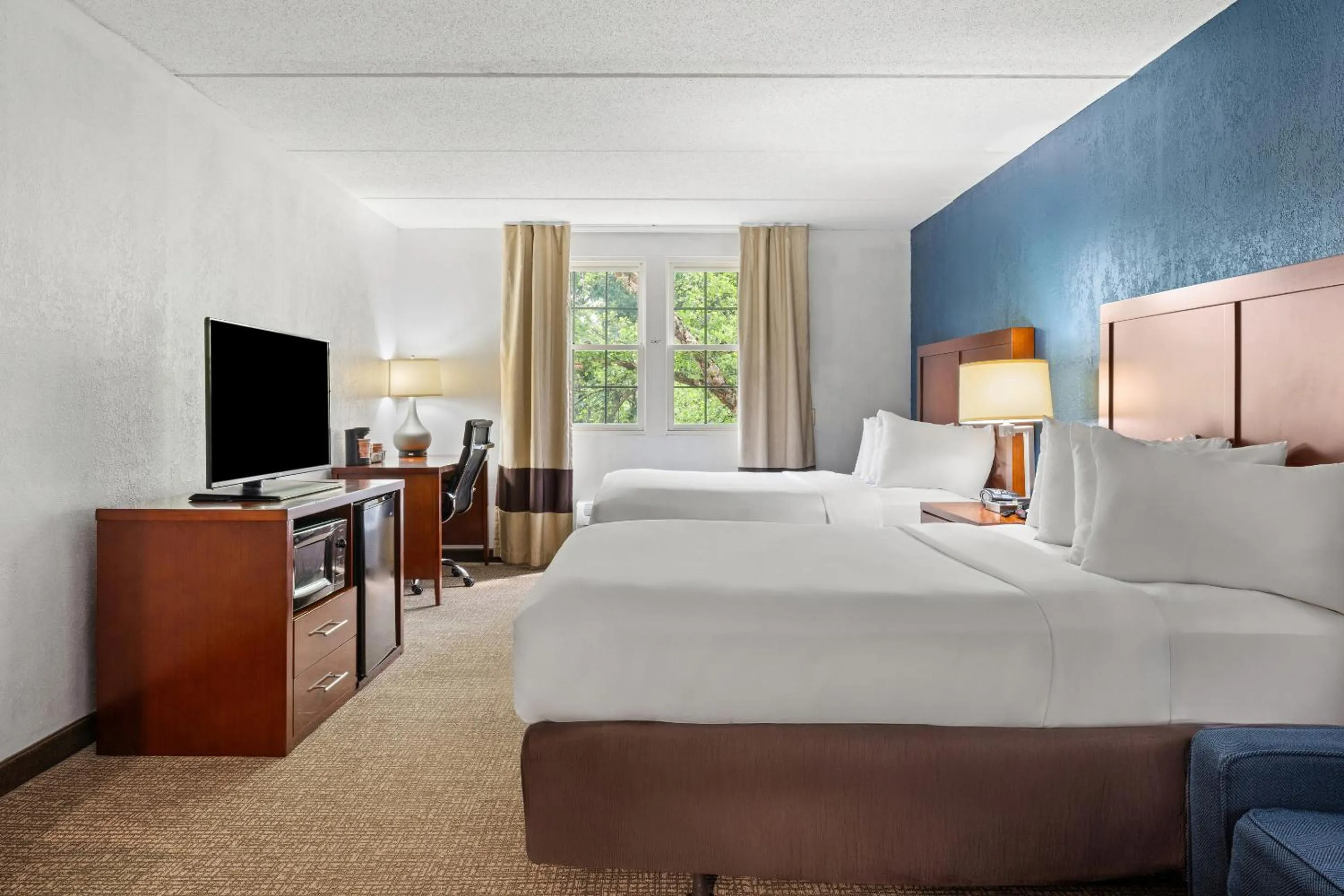 Bed in Comfort Suites Near Casinos