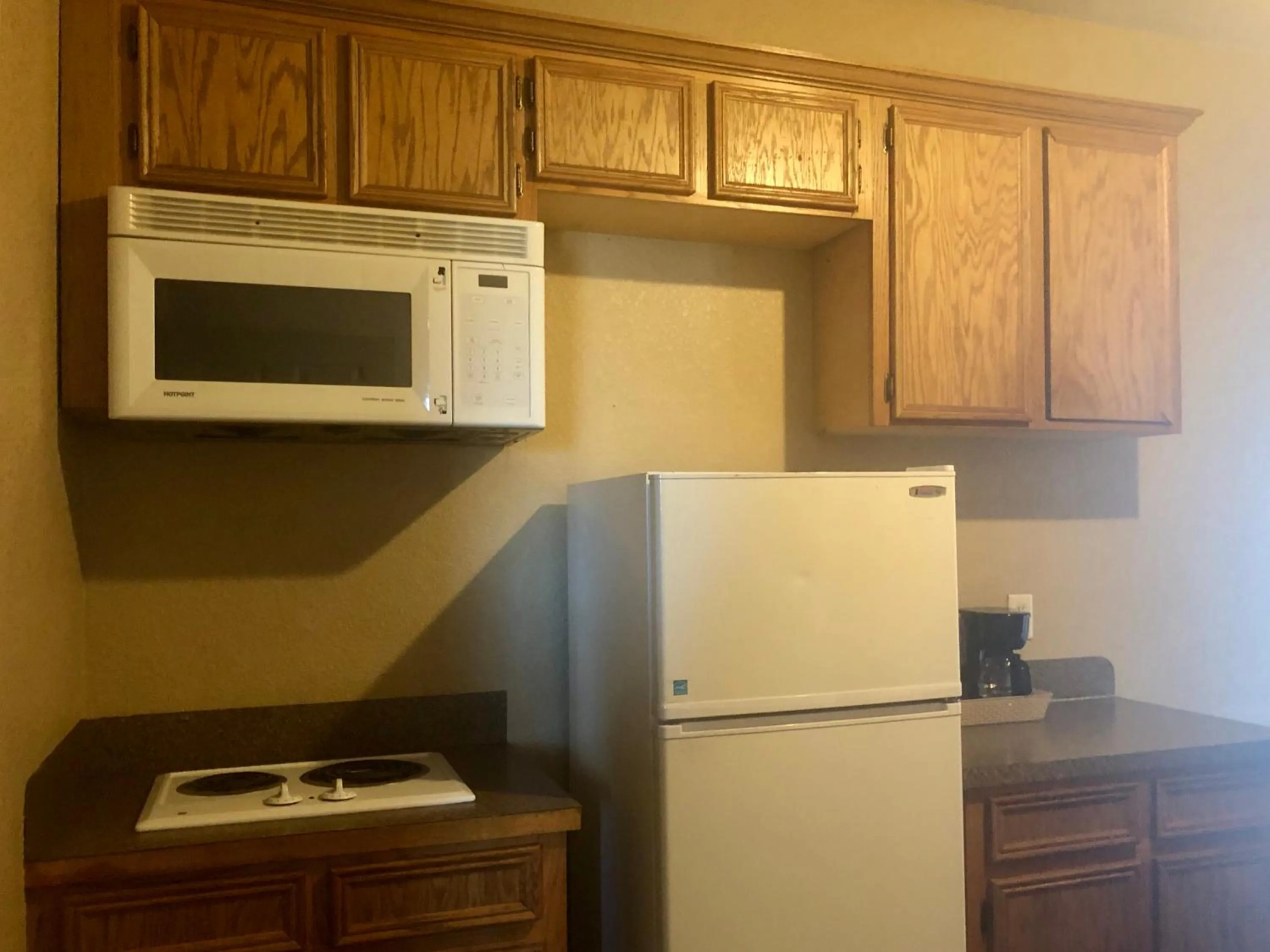 Kitchen or kitchenette in Lone Star Inn & Suites