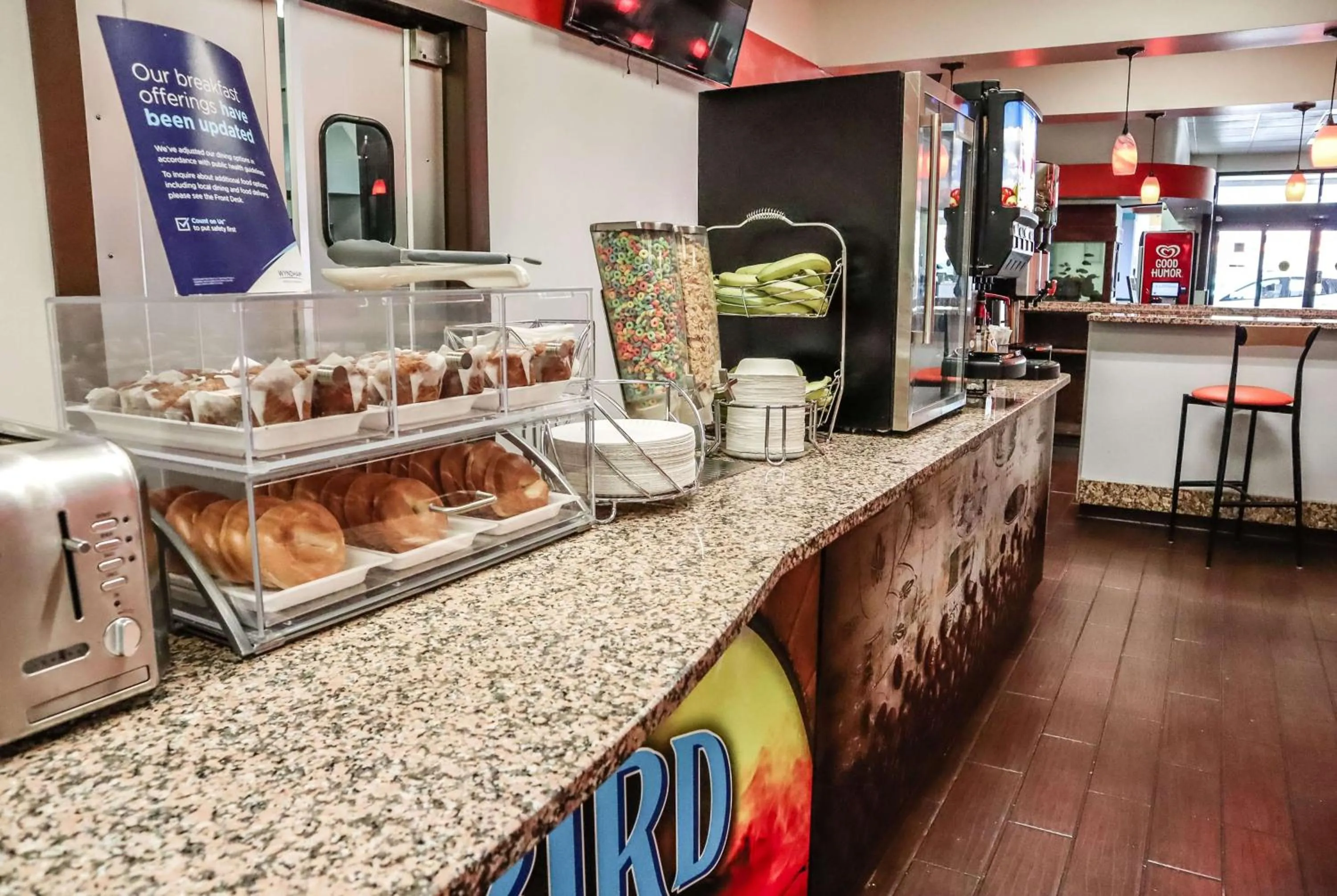 Kitchen or kitchenette in Howard Johnson by Wyndham Ocala FL I-75