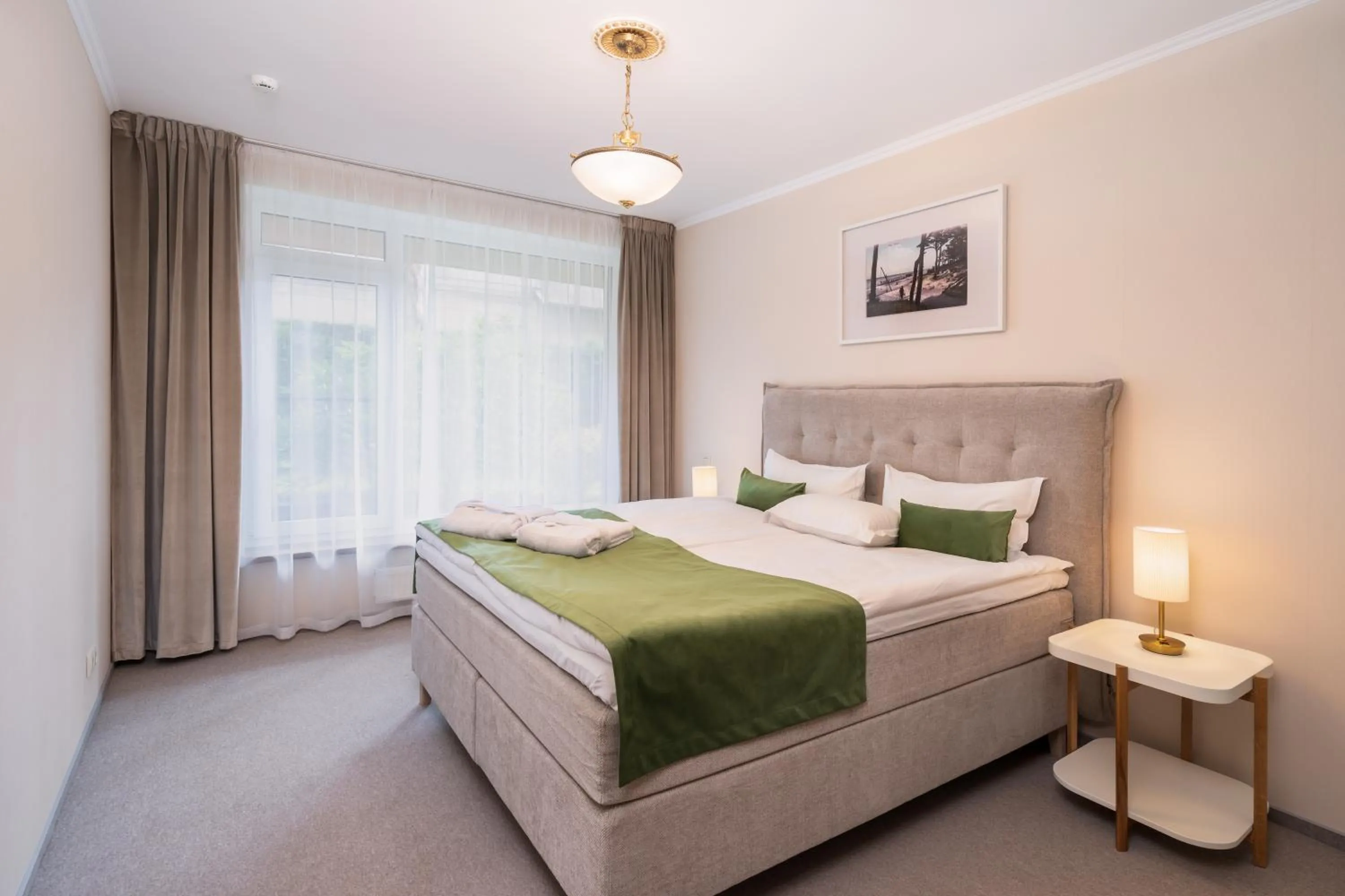 Bed in Villa Alvīne Family Apart-Hotel