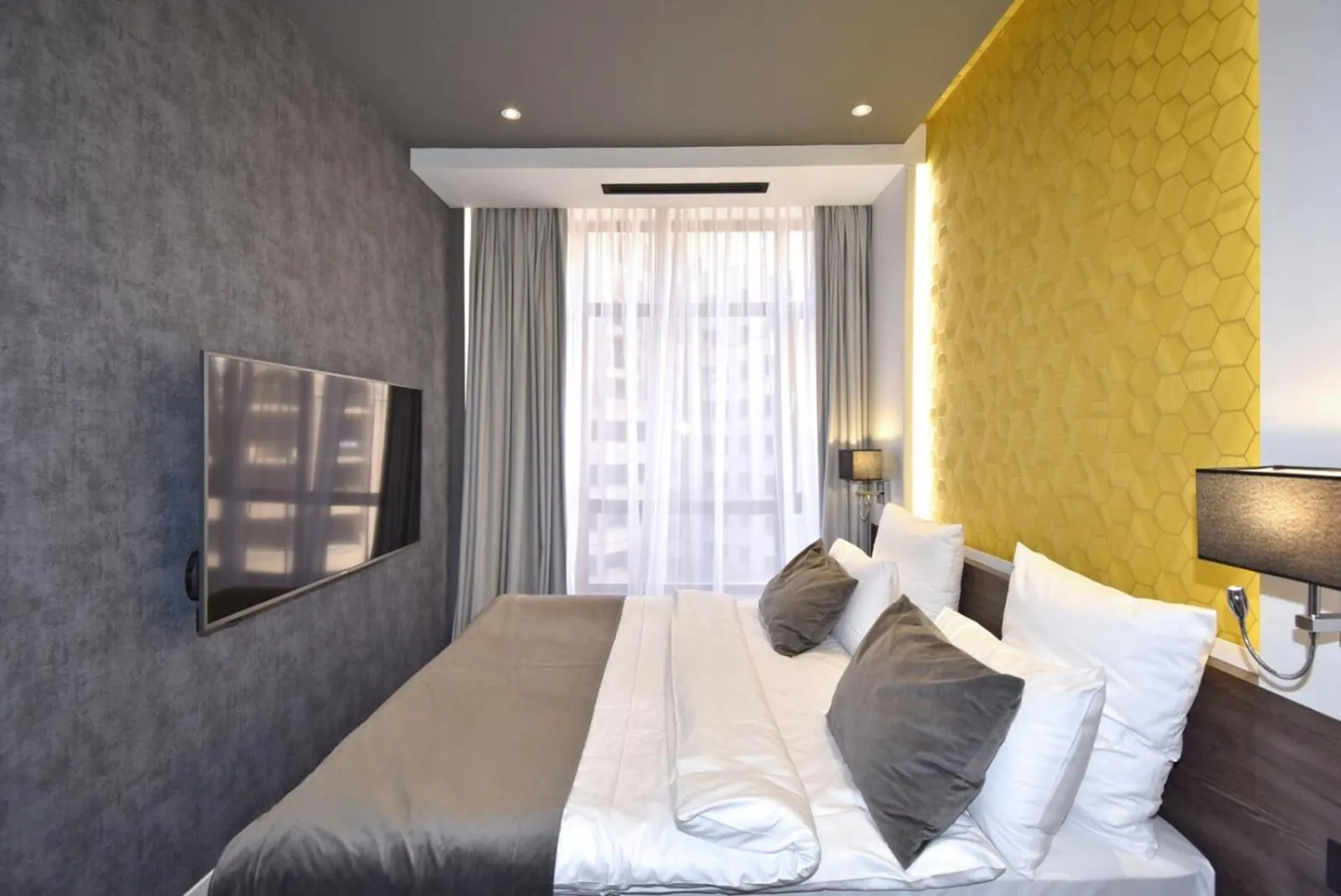 Bed in Avenue ApartHotel