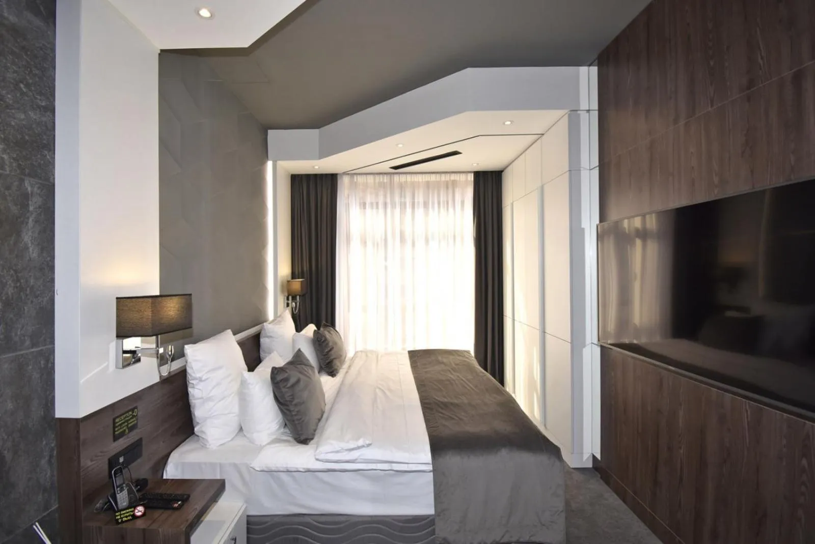 Bed in Avenue ApartHotel