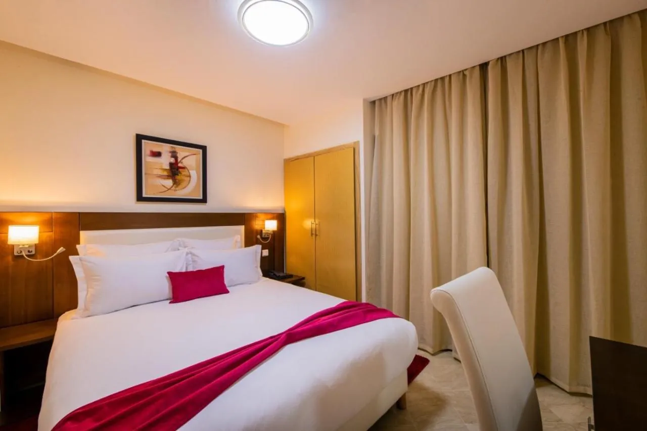 Bed in Appart-hotel Marrakech Inn