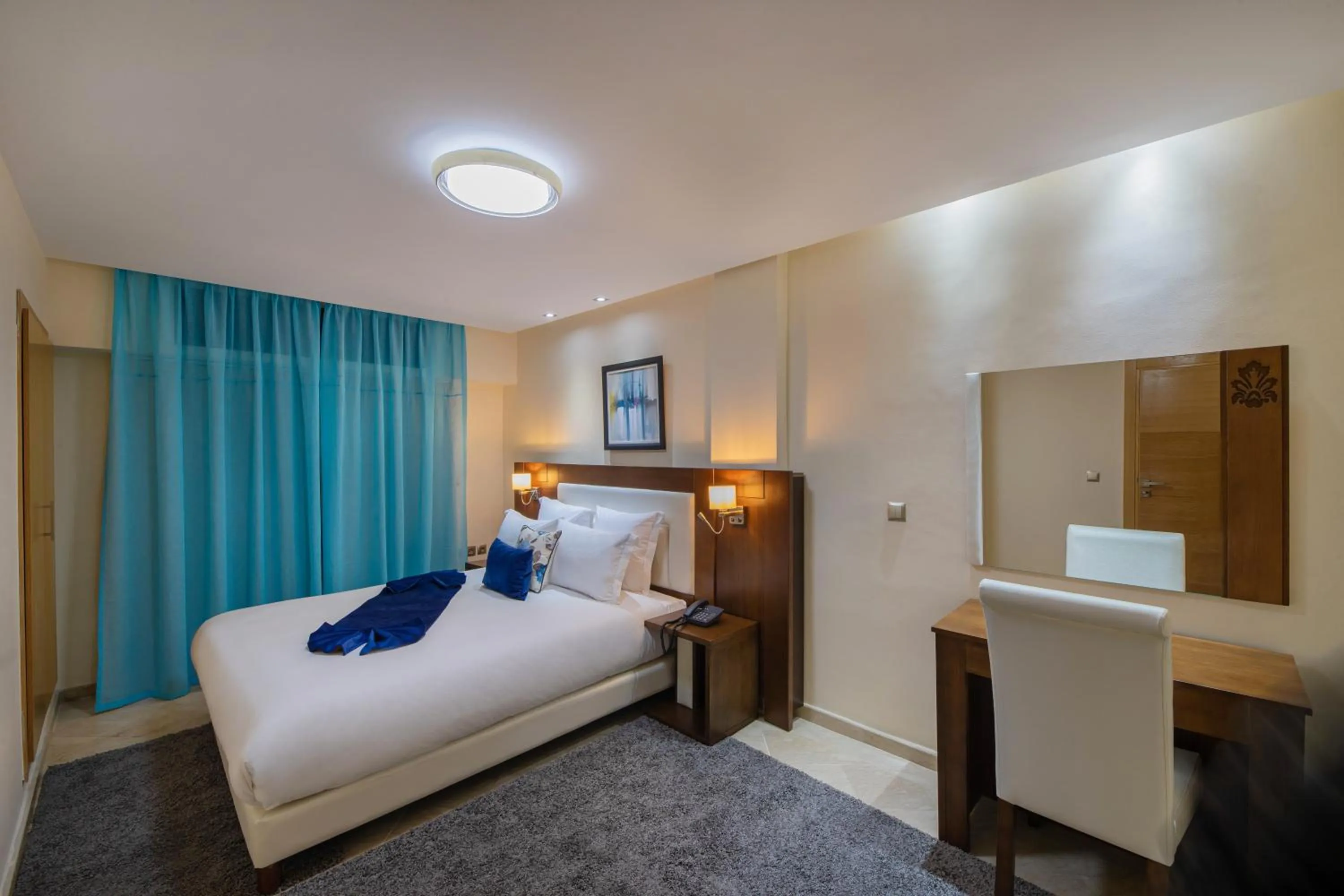 Bed in Appart-hotel Marrakech Inn