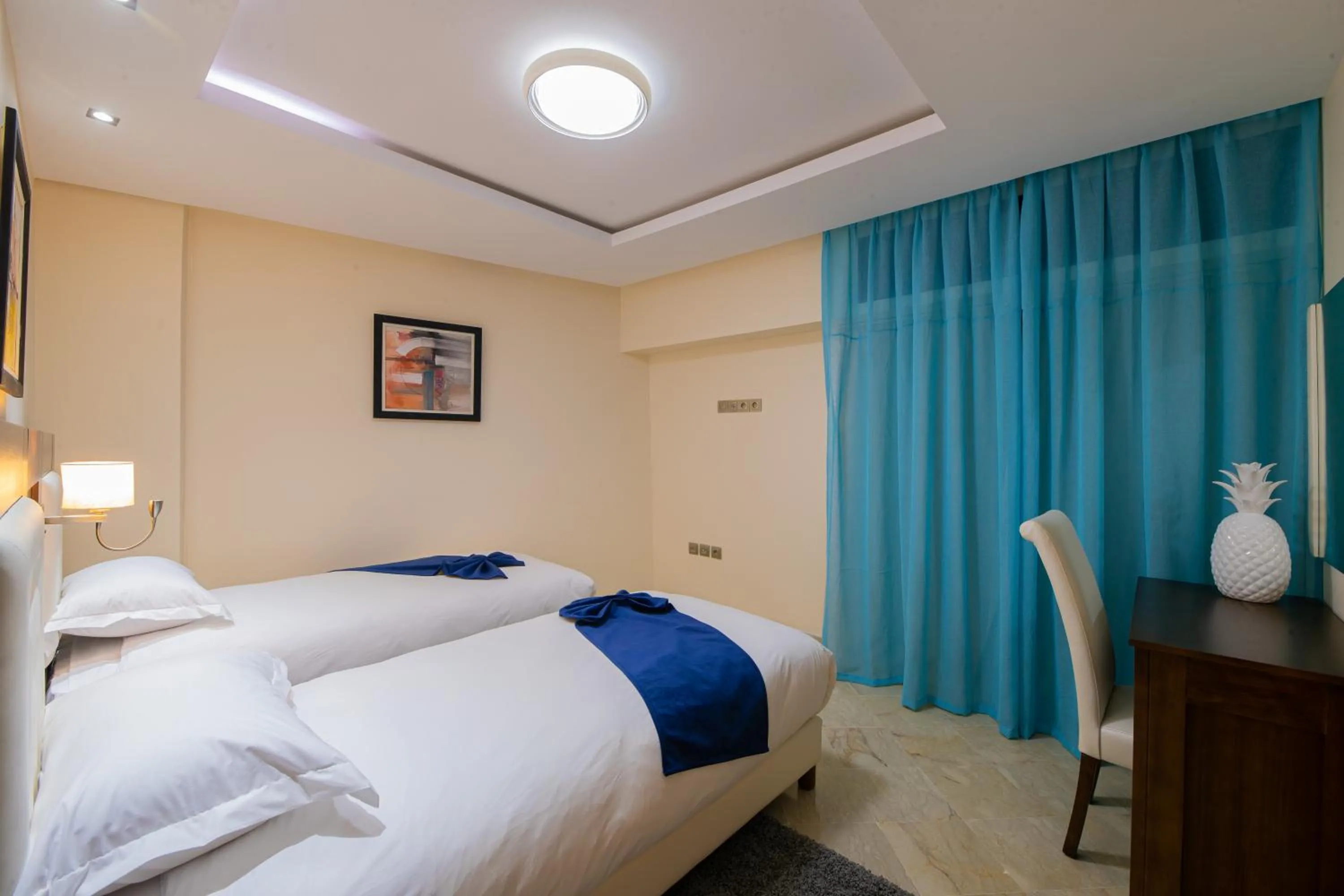 Bed in Appart-hotel Marrakech Inn