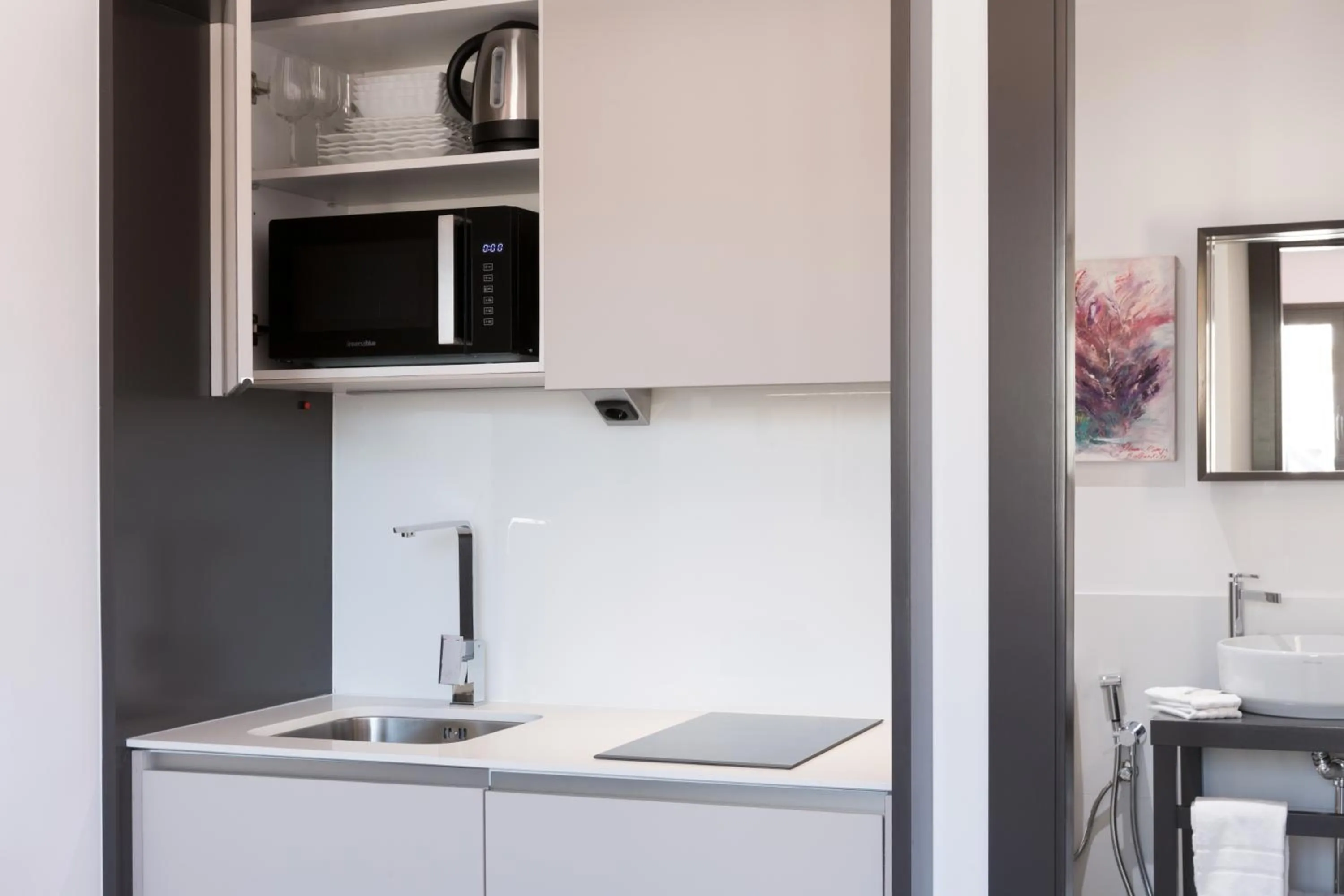 Kitchen or kitchenette in Puerta Catedral Holiday Suites