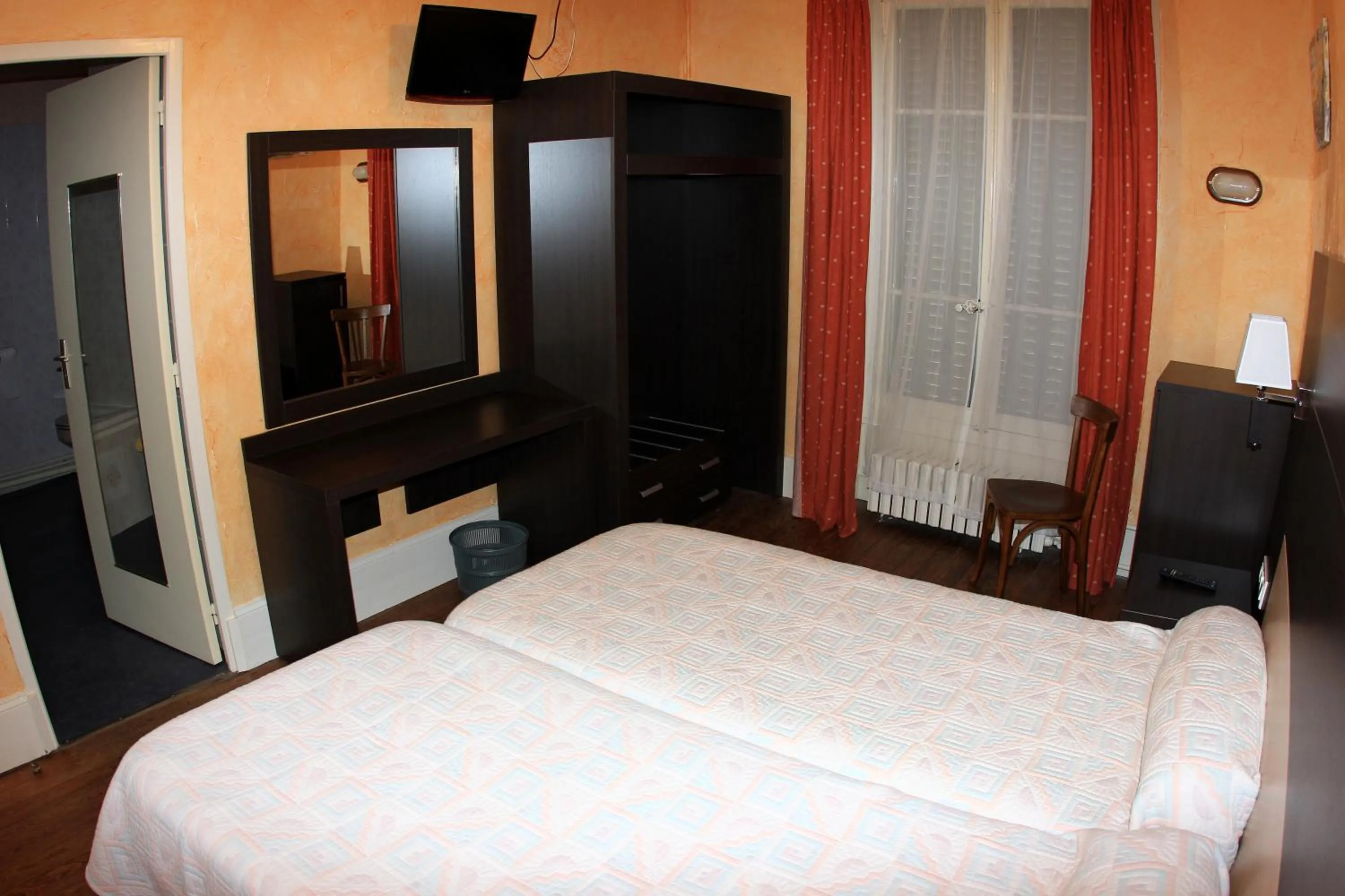 Bed in Hotel de la Basilique