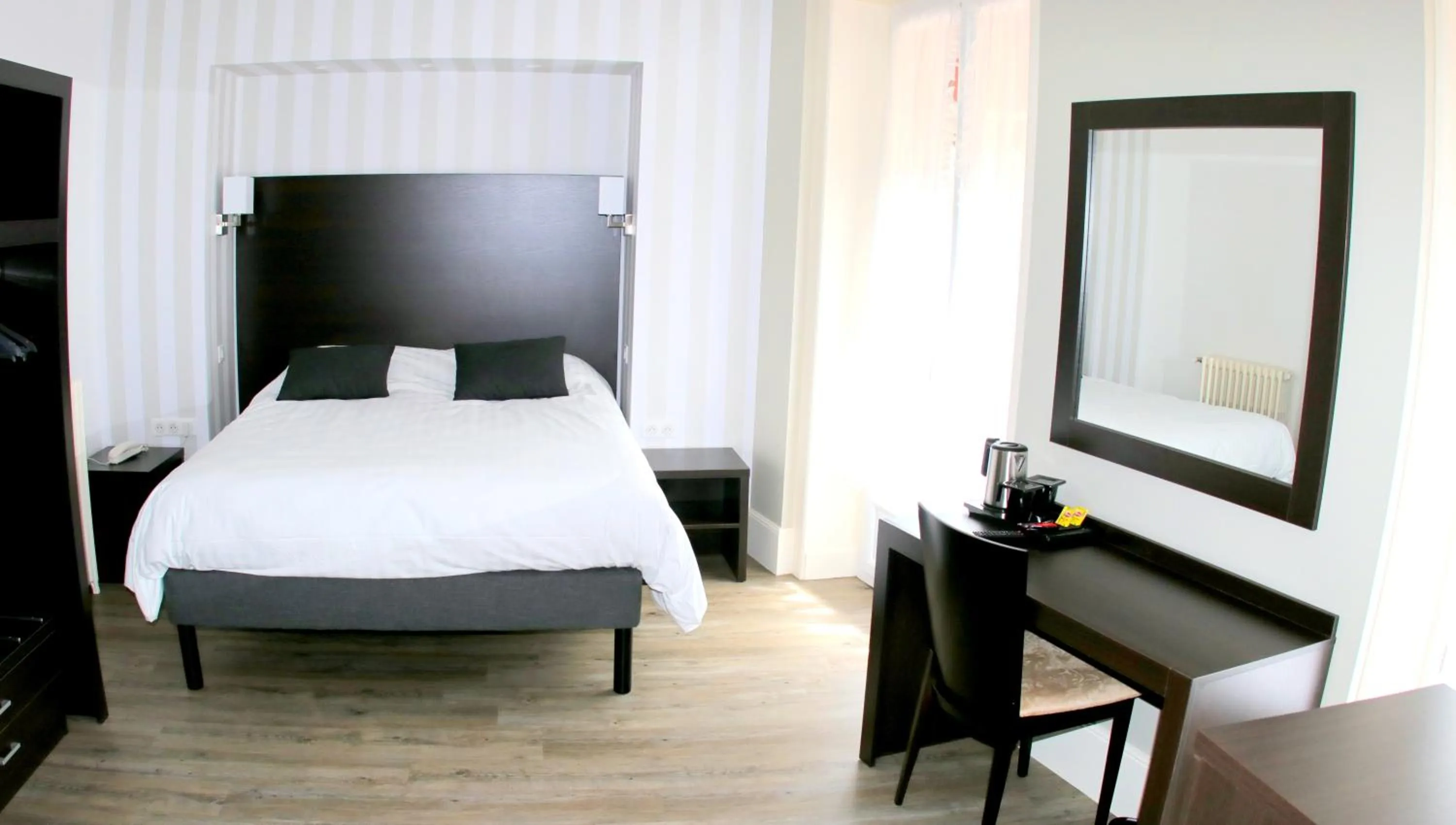 Bedroom in Hotel de la Basilique