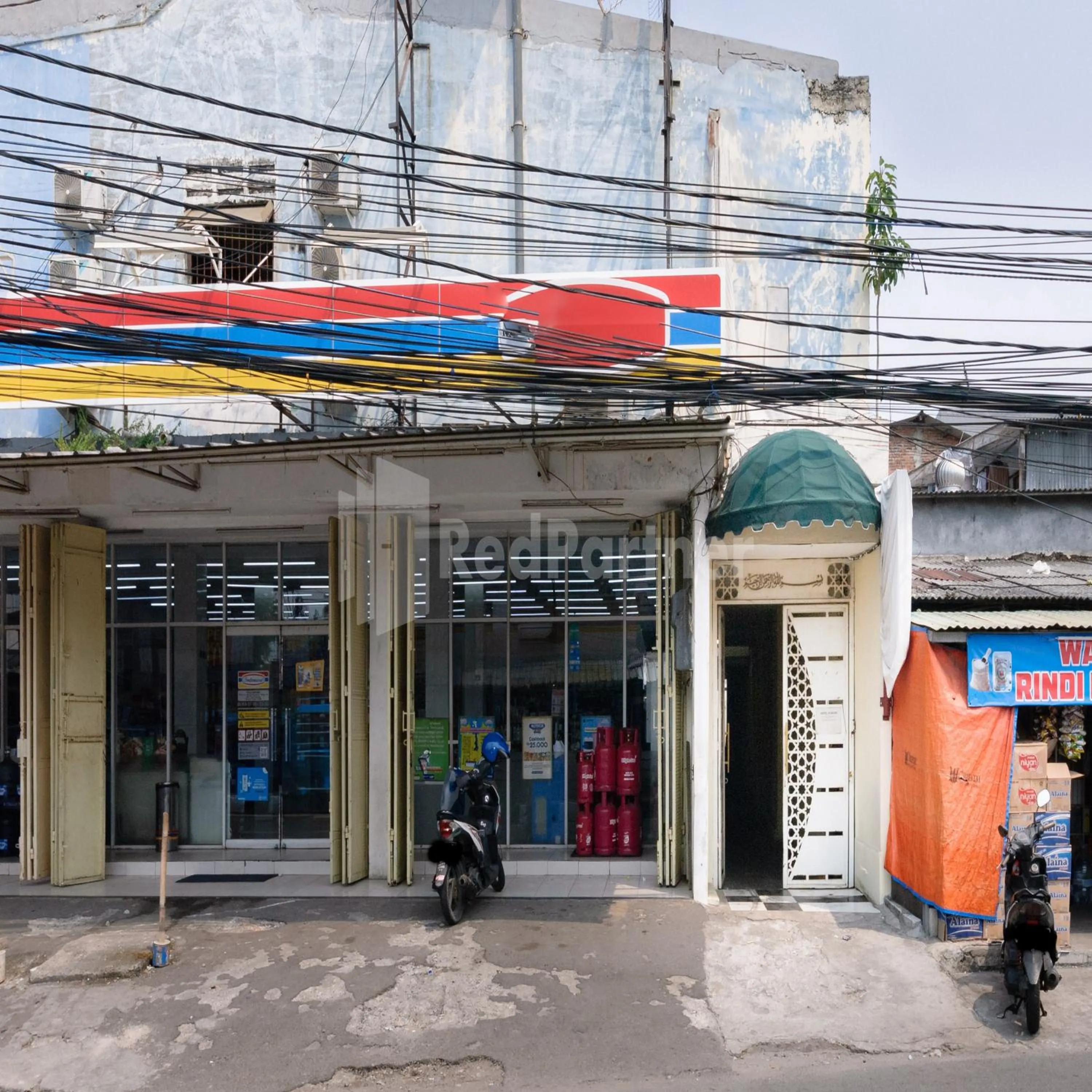 Facade/entrance in Pulogadung Residence by Nam RedPartner