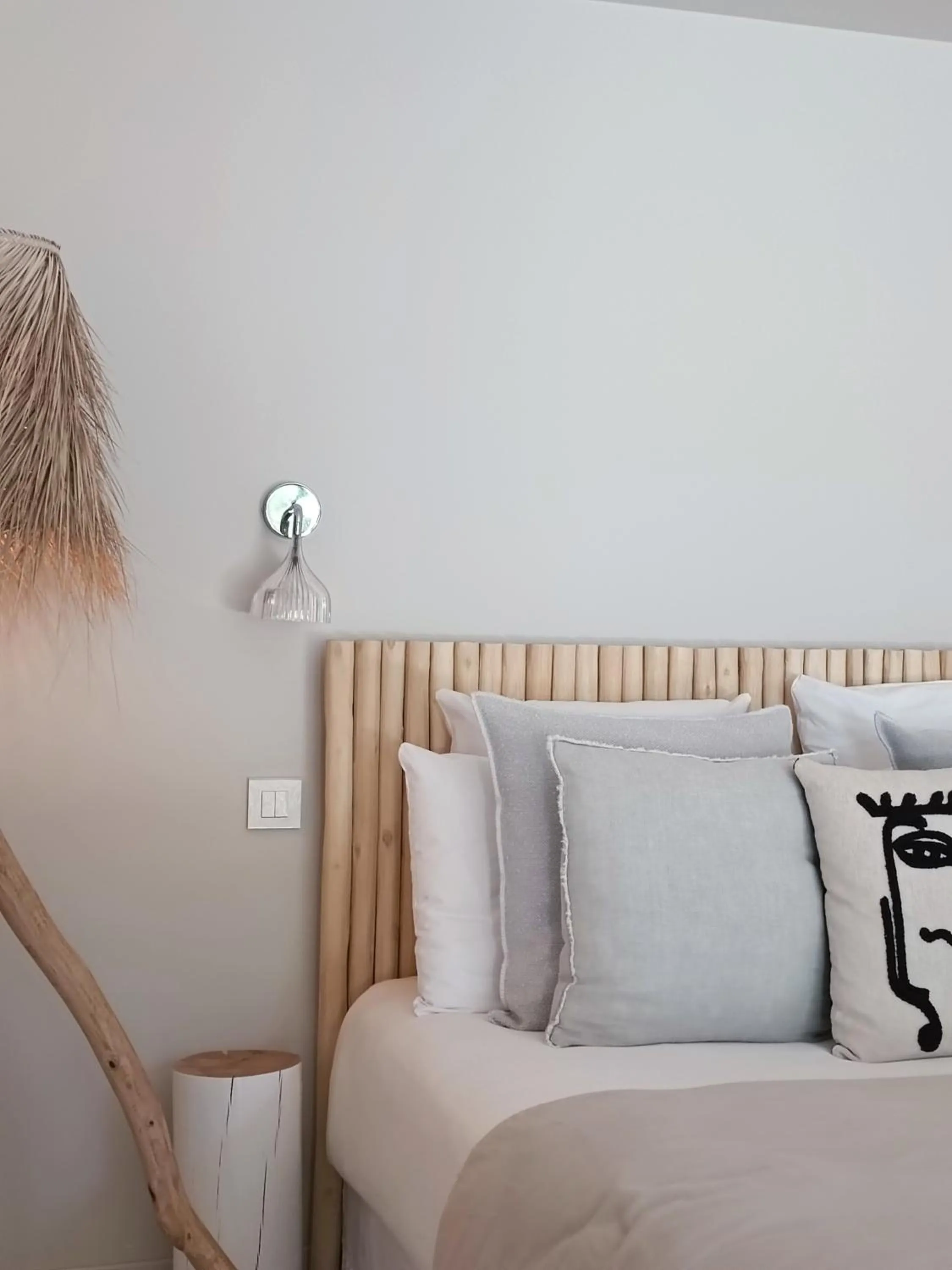 Bed in Hôtel Les Suites Du Maquis