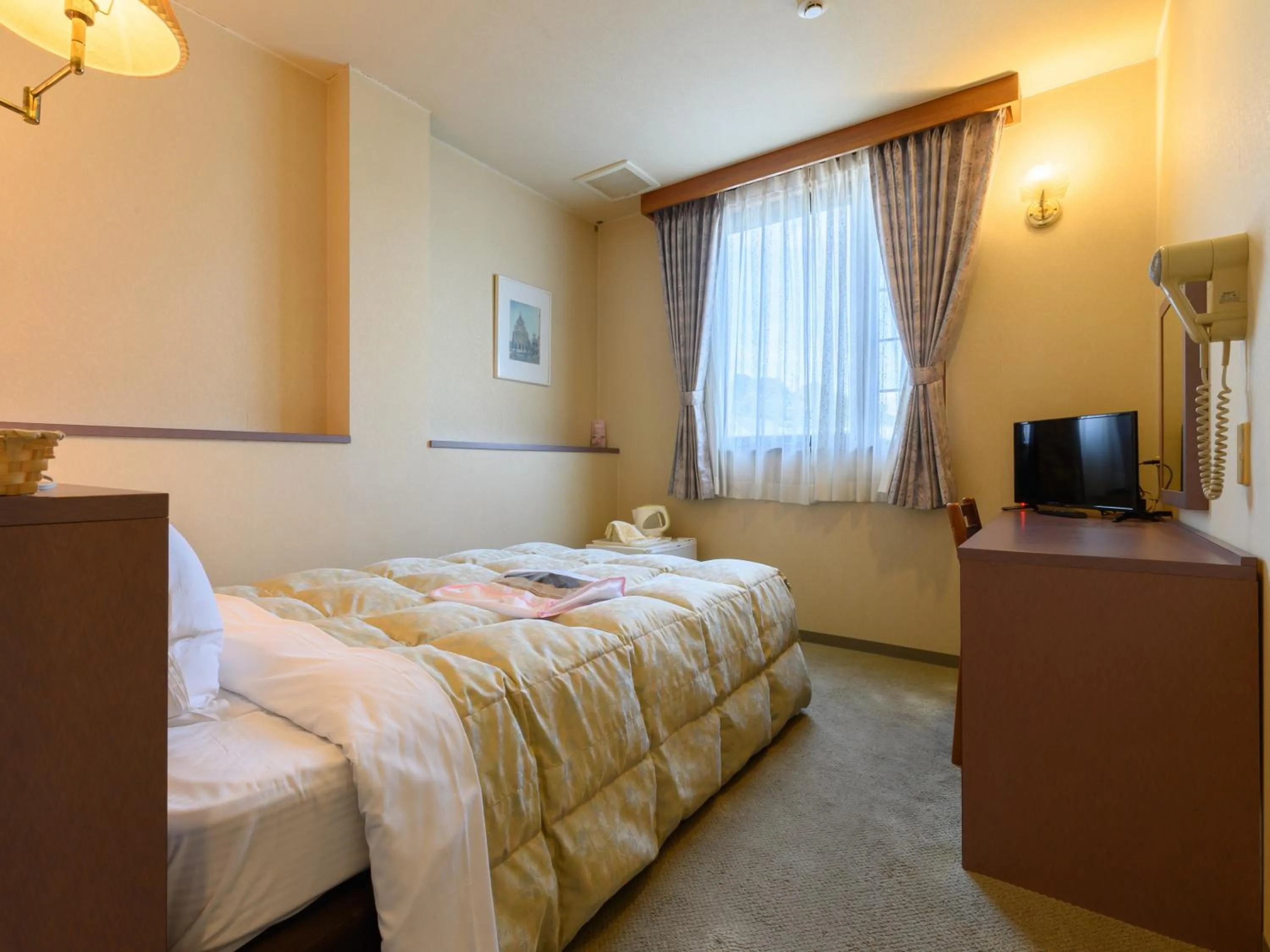 Photo of the whole room, Bed in Tabist Station Hotel Isobe Ise-Shima