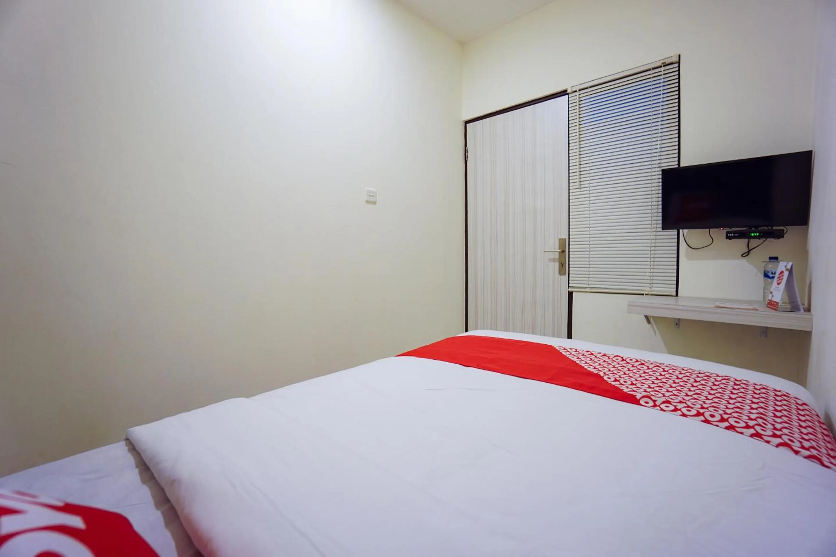 Bedroom in Super OYO 1838 COZY Home