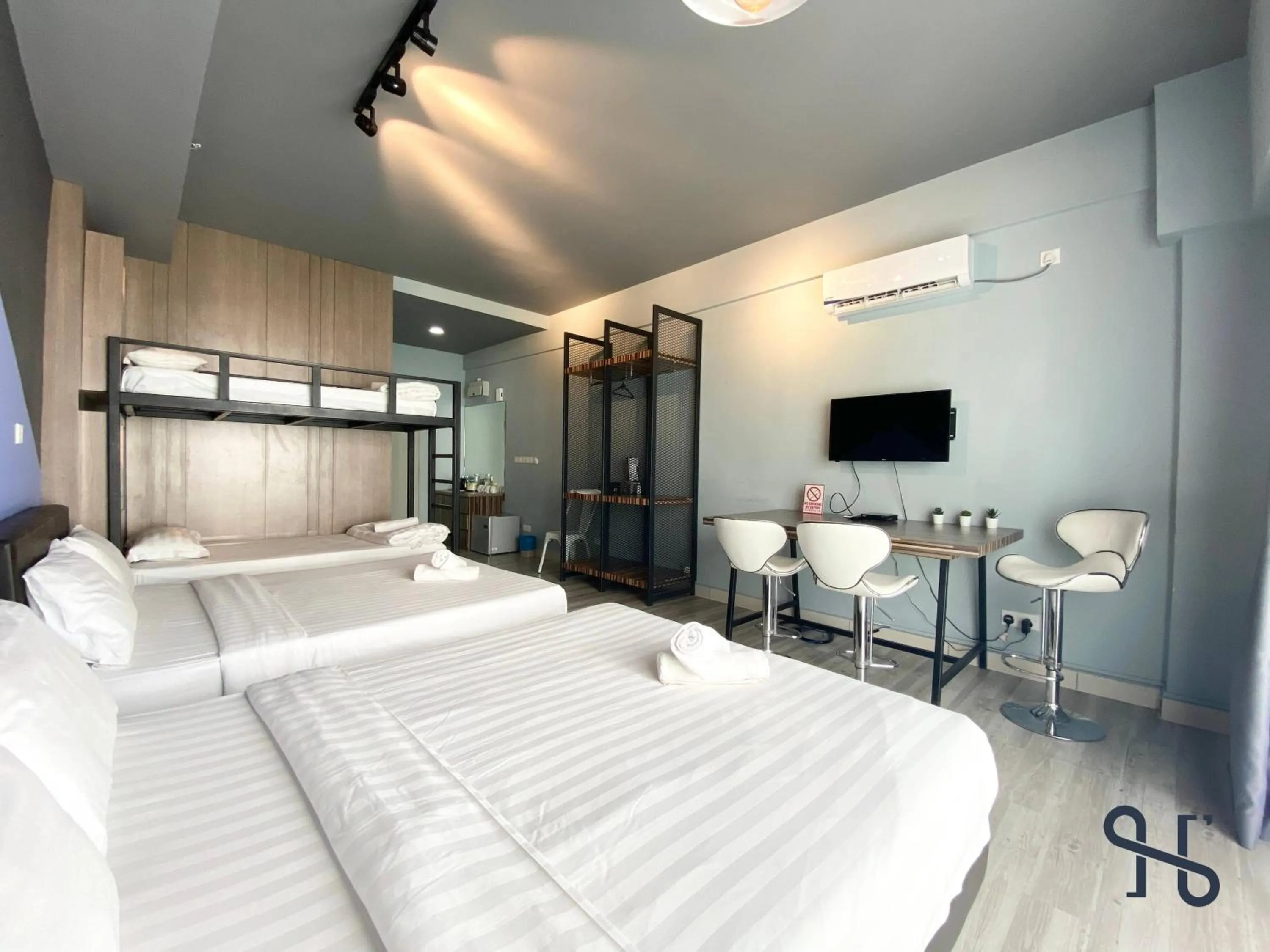 Bed in Homesuite' Home at Aeropod SOVO