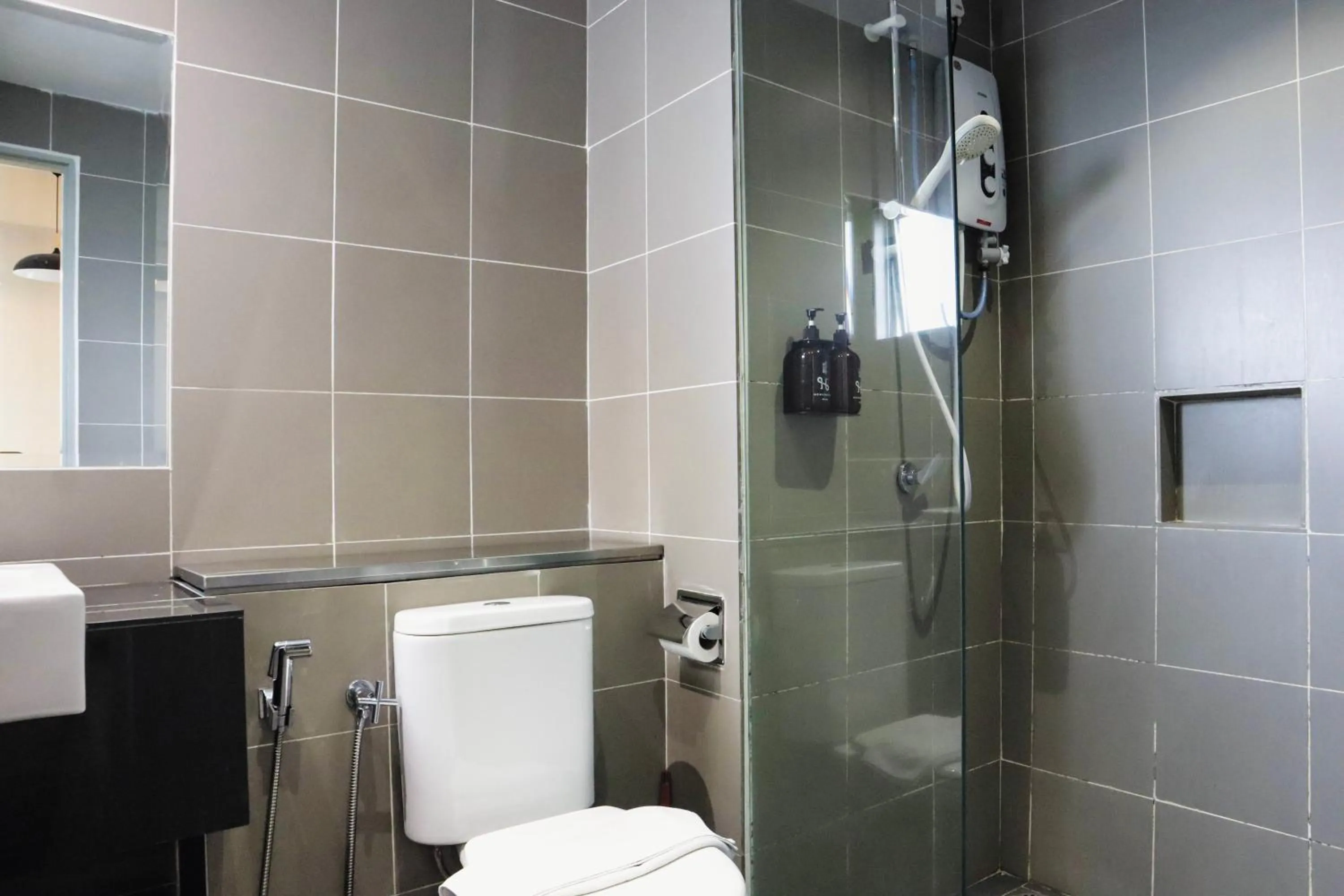 Shower in Homesuite' Home at Aeropod SOVO