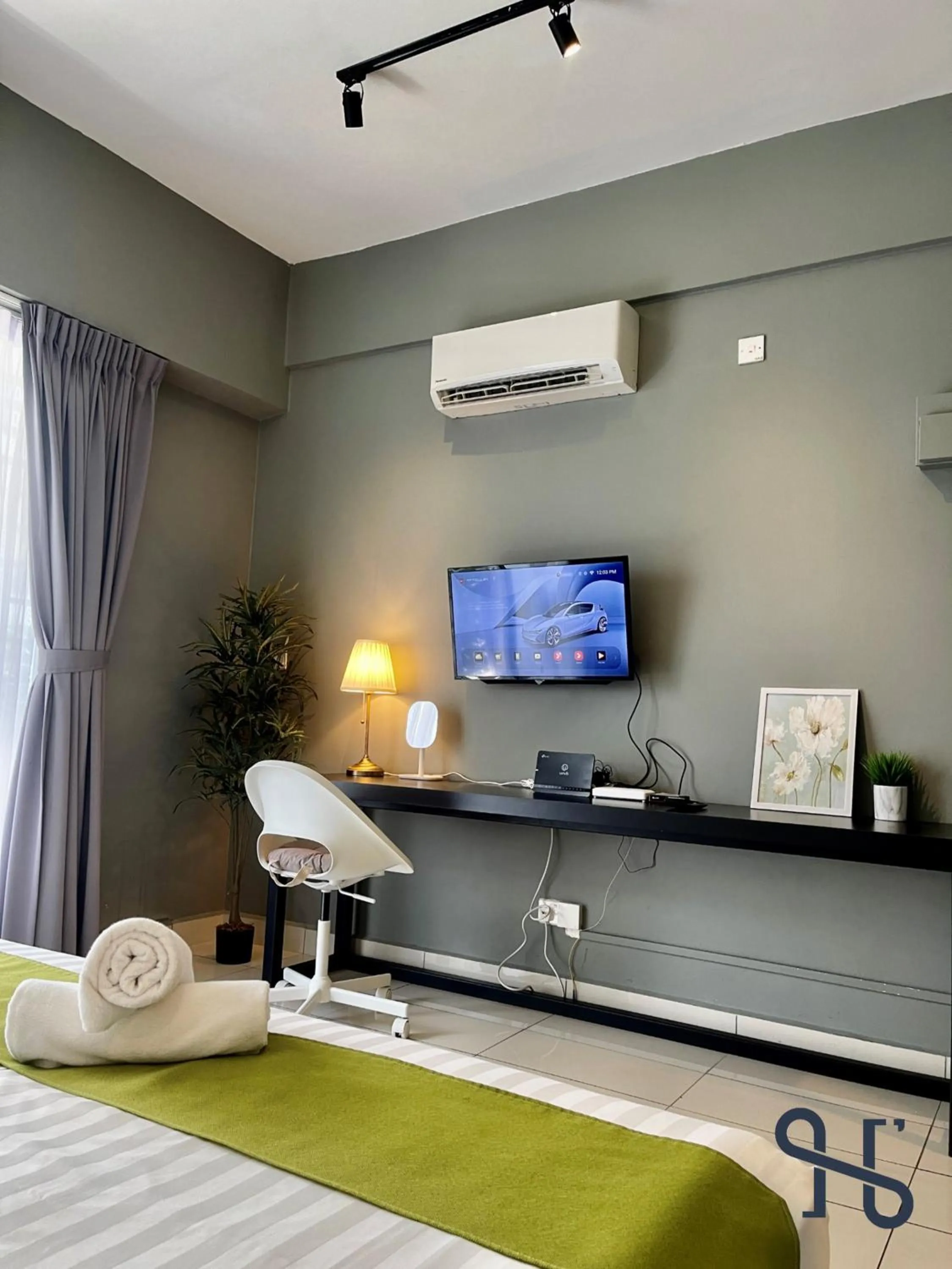 Bed in Homesuite' Home at Aeropod SOVO