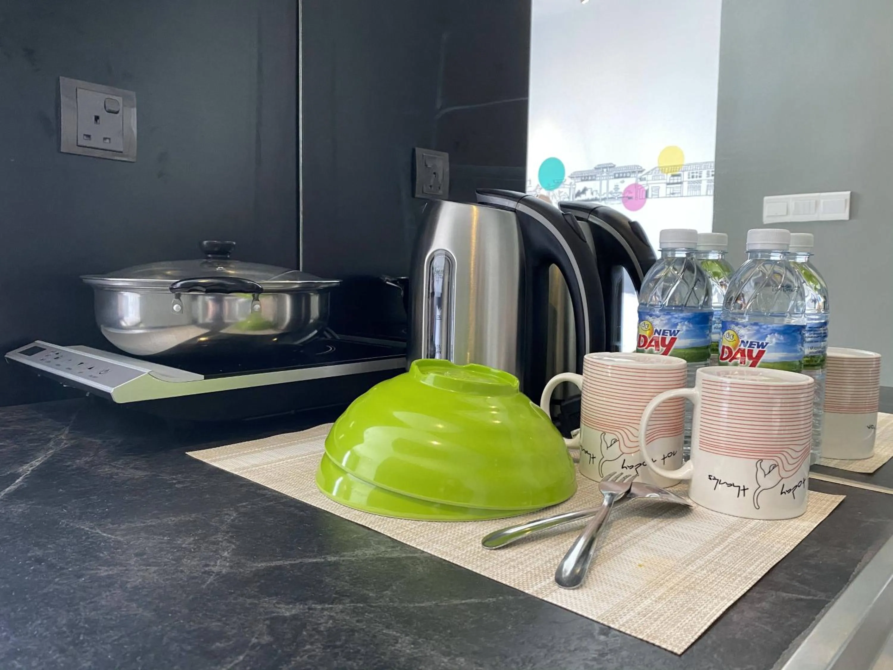 kitchen in Homesuite' Home at Aeropod SOVO