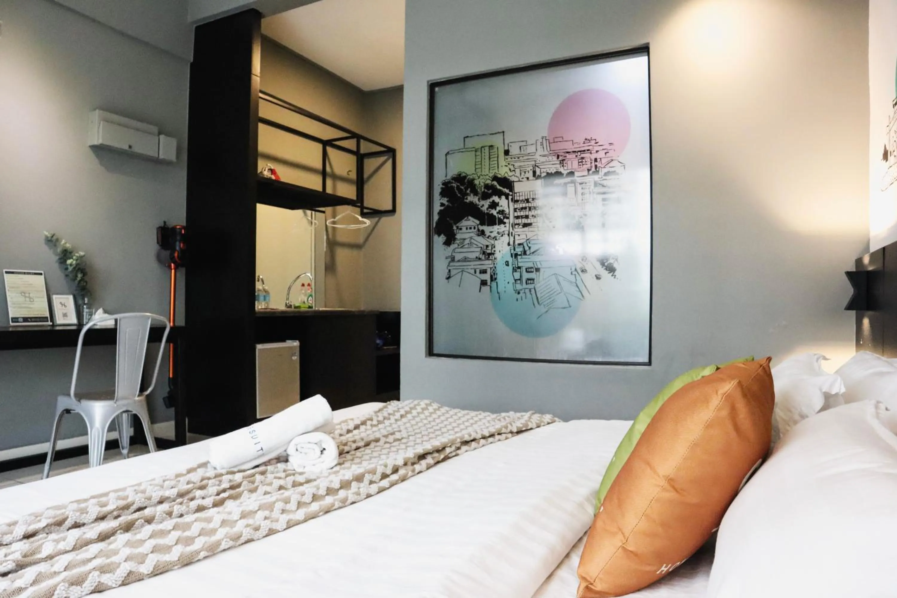 Bed in Homesuite' Home at Aeropod SOVO