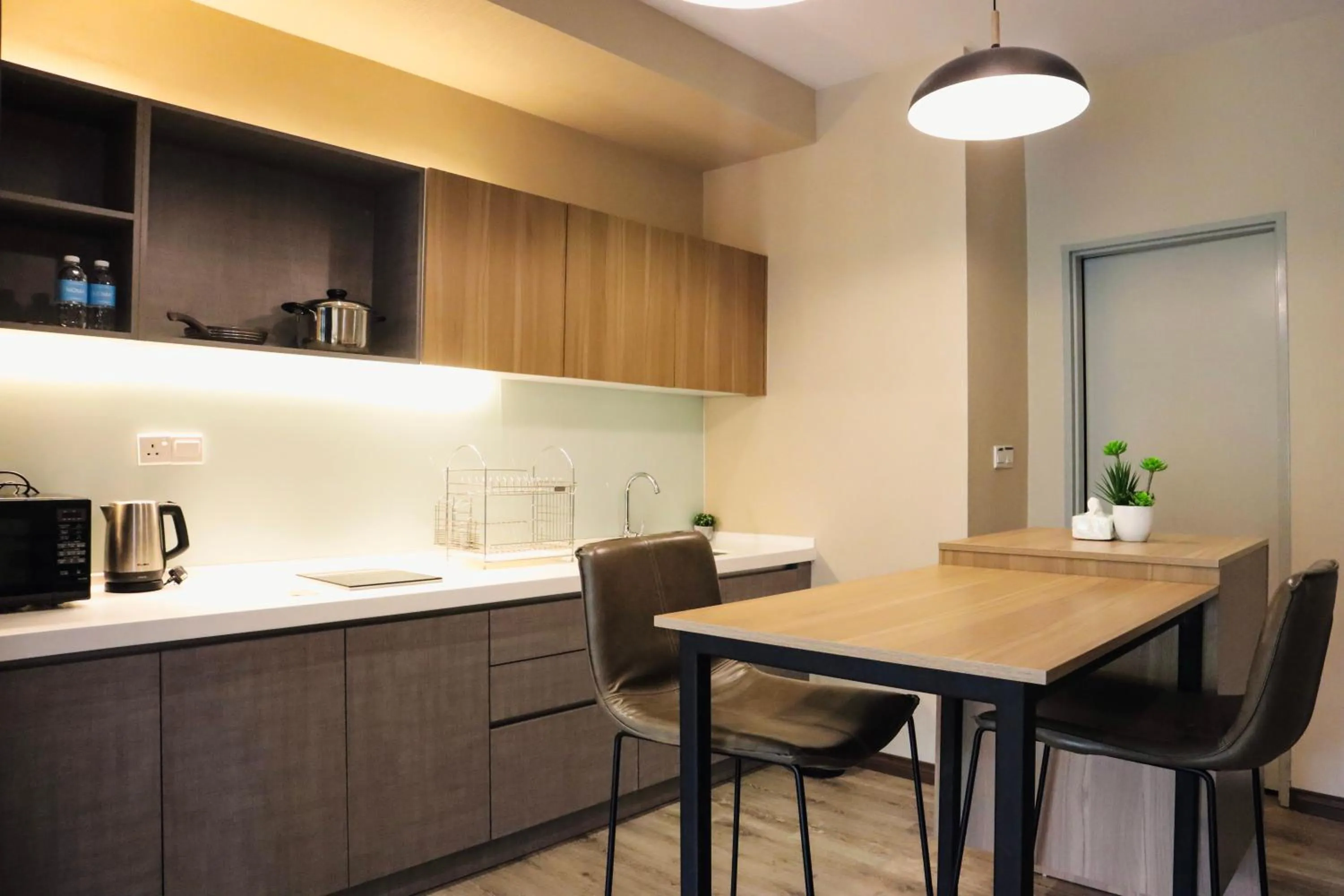 Kitchen or kitchenette in Homesuite' Home at Aeropod SOVO