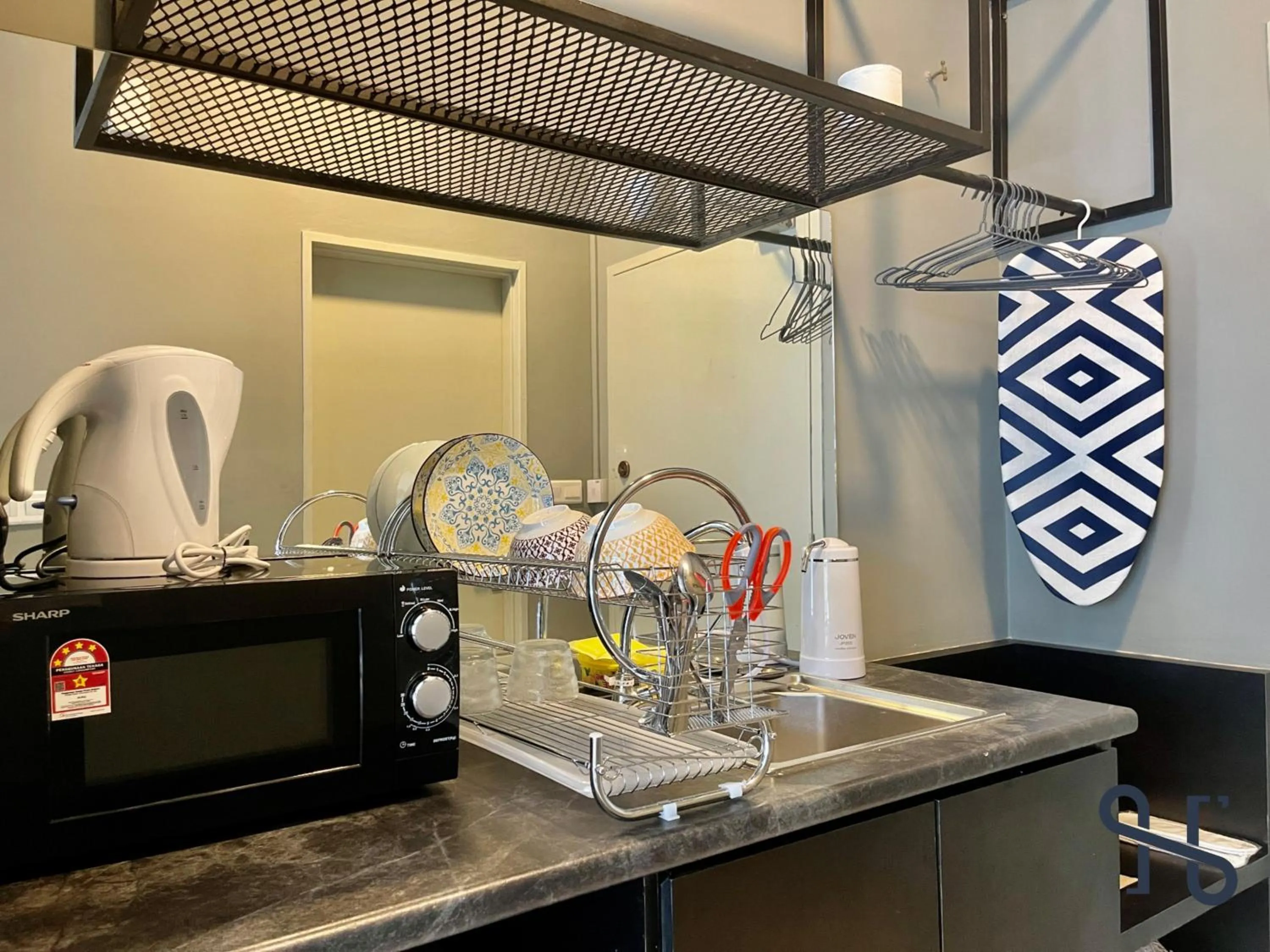 Coffee/tea facilities in Homesuite' Home at Aeropod SOVO