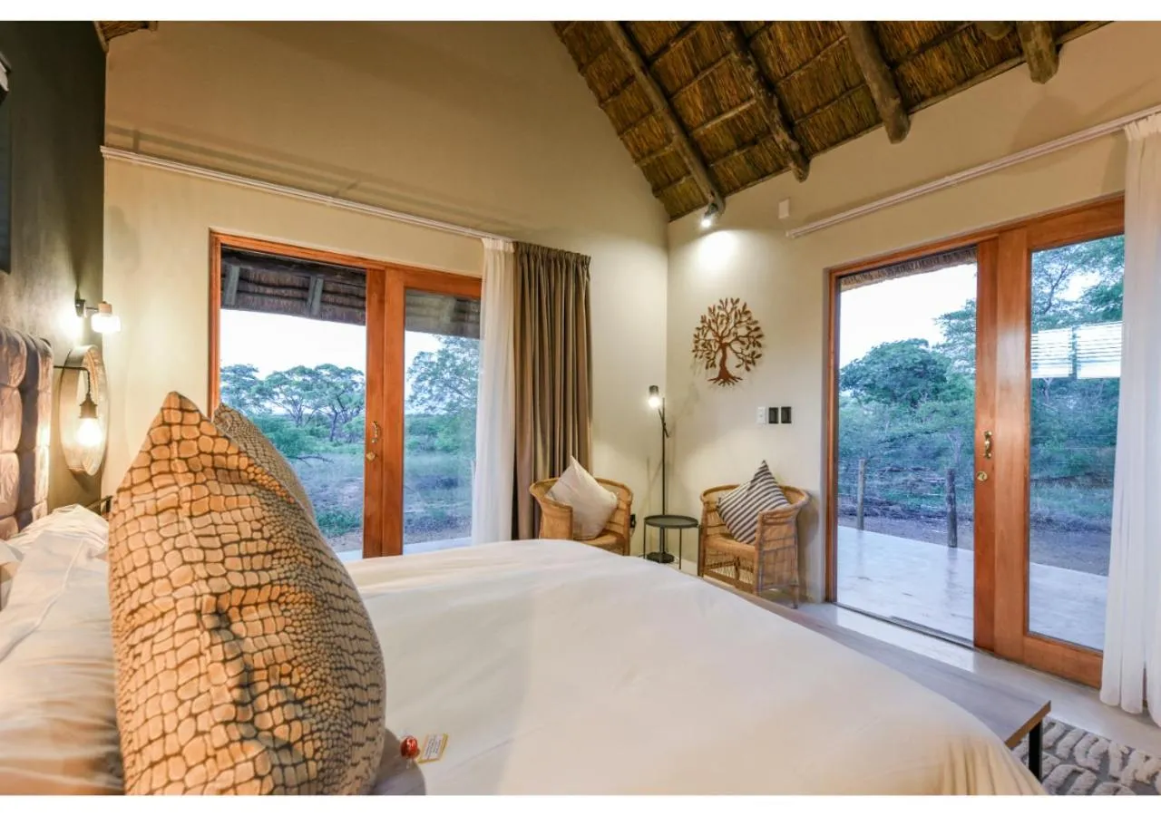 Bed in Mziki Safari Lodge