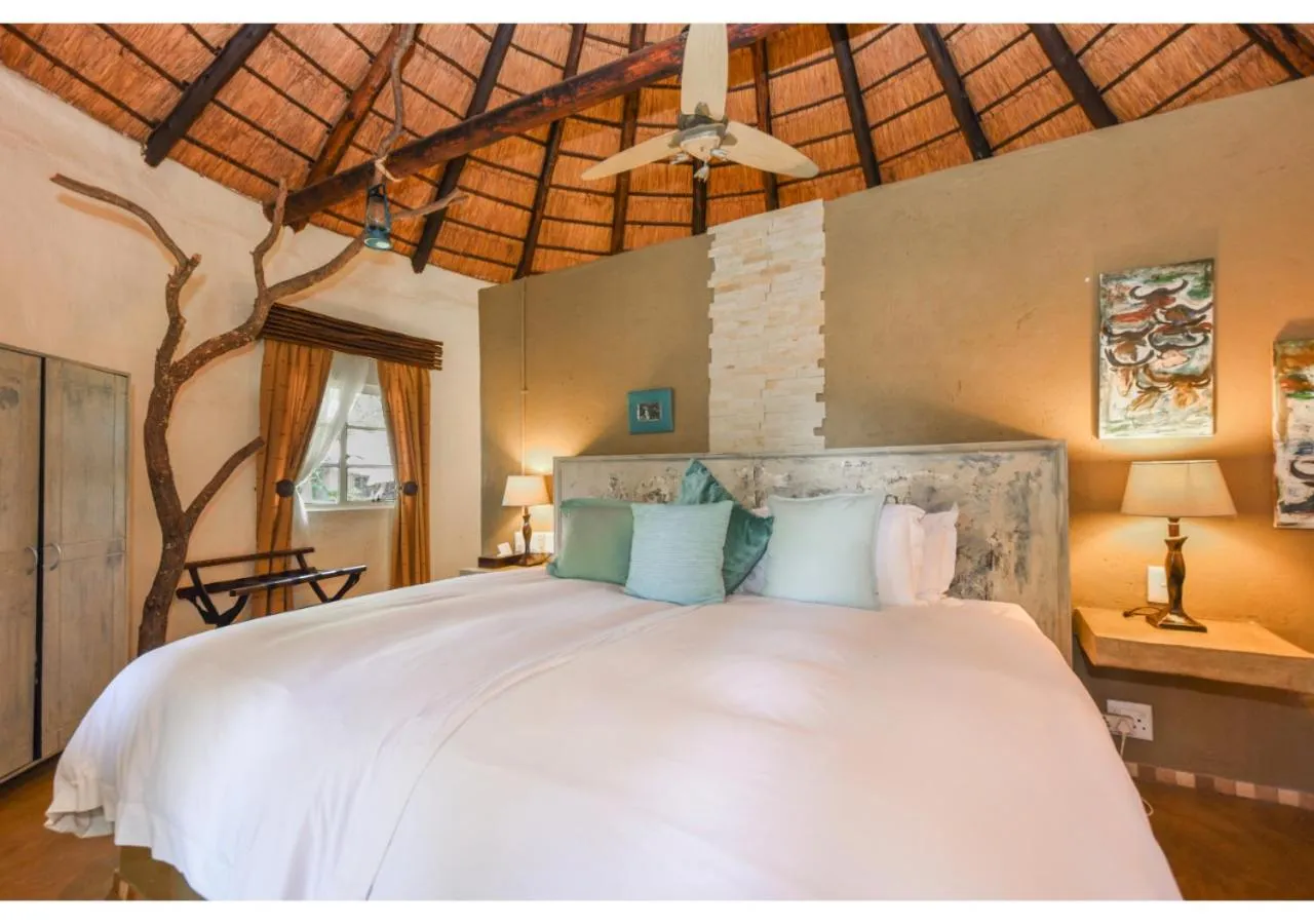 Bed in Mziki Safari Lodge