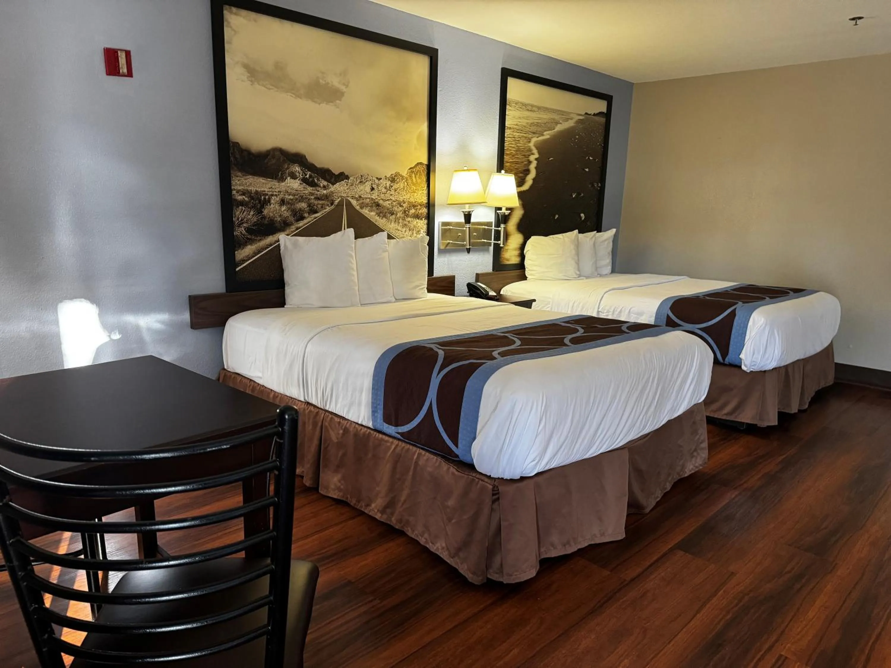 Photo of the whole room in Super 8 by Wyndham Houston Webster NASA