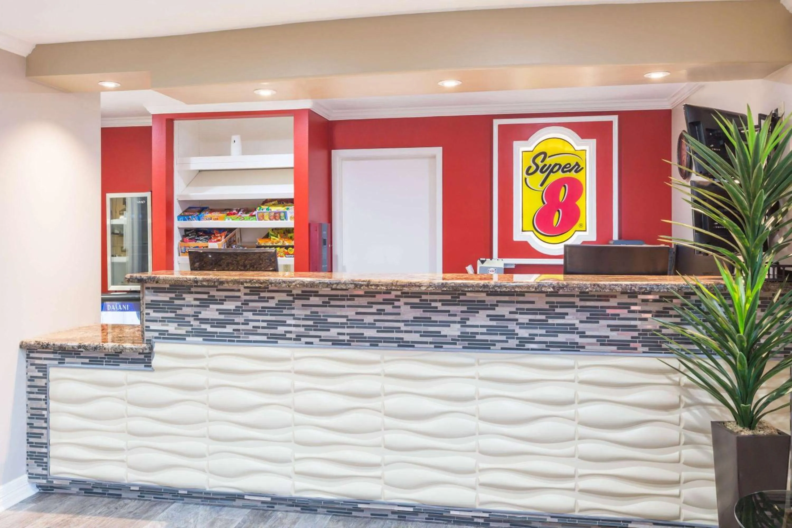 Lobby or reception in Super 8 by Wyndham Houston Webster NASA