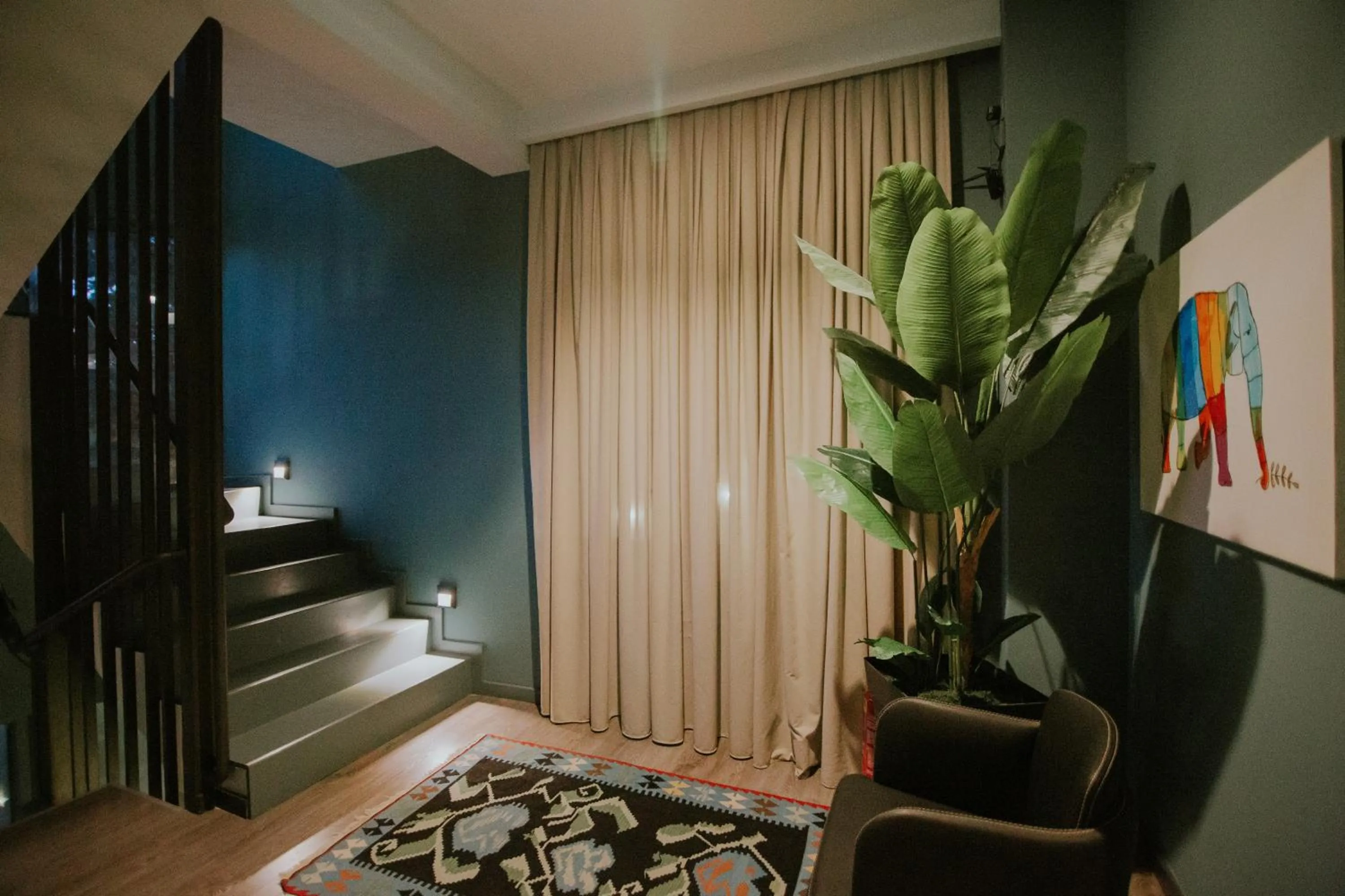 Seating area in Dim's Hotel & Restaurant