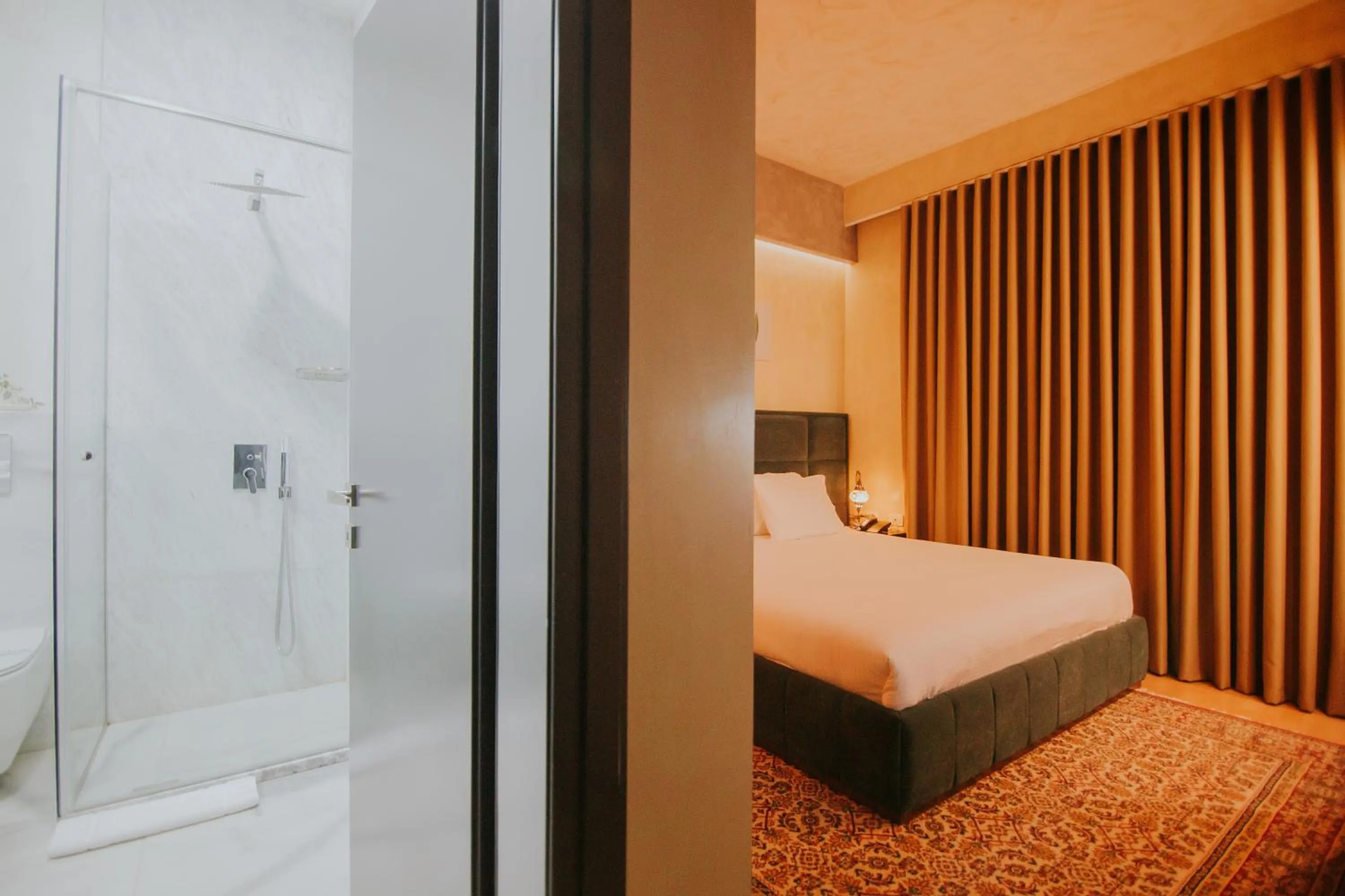 Bed in Dim's Hotel & Restaurant