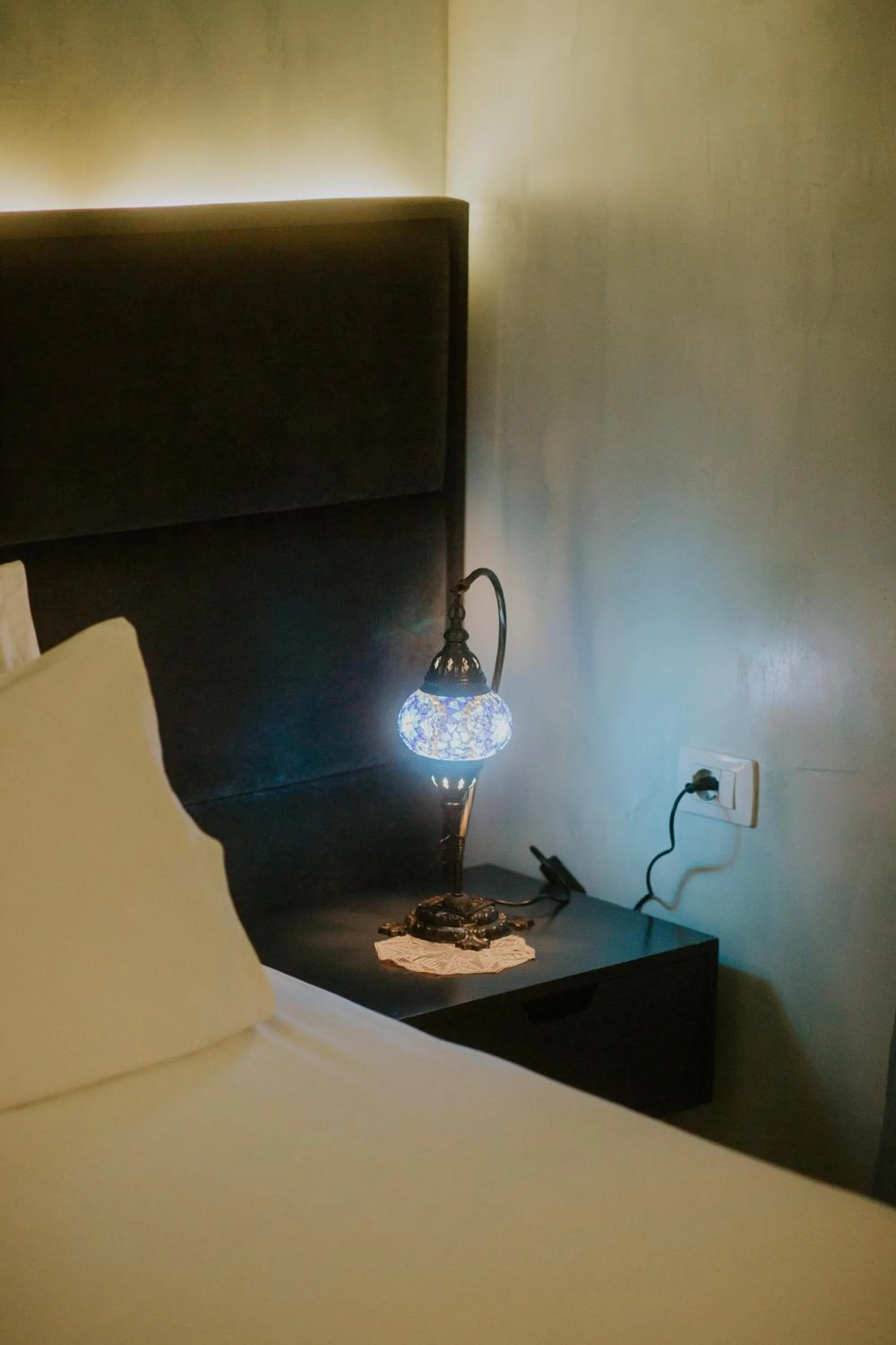 Bed in Dim's Hotel & Restaurant