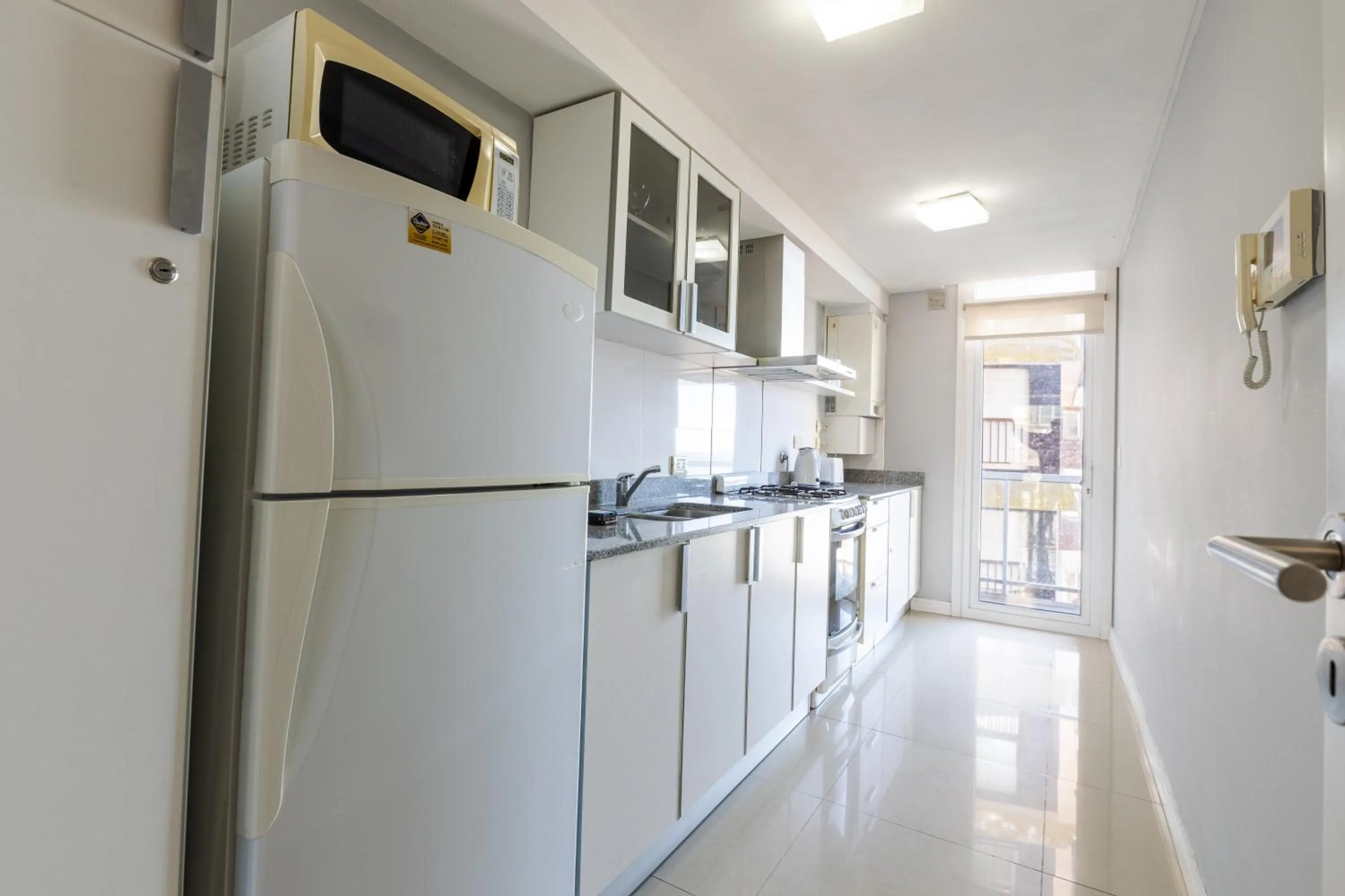 Kitchen or kitchenette in DeptosVip - Gascón