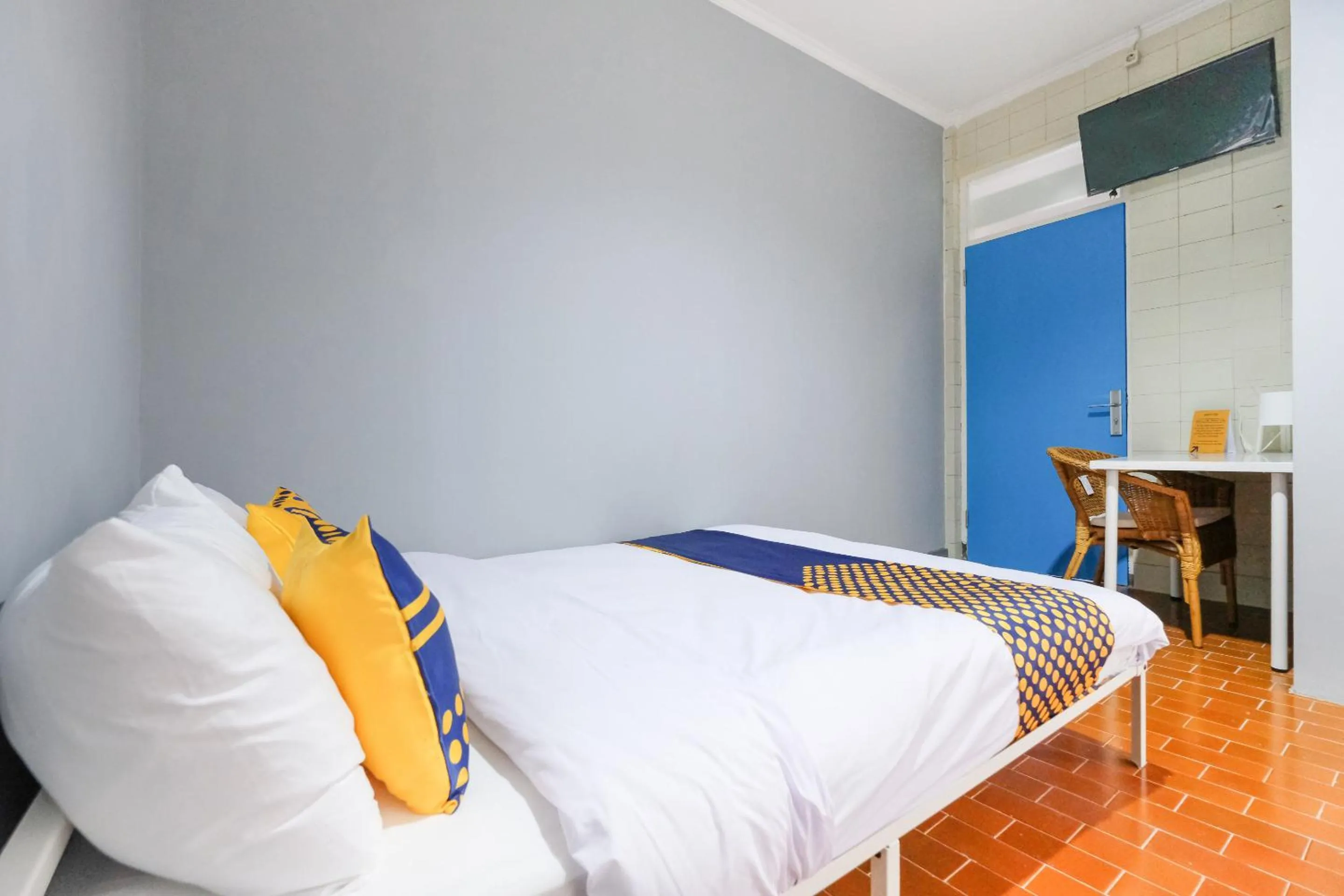 Bedroom in SPOT ON 2281 Omajo