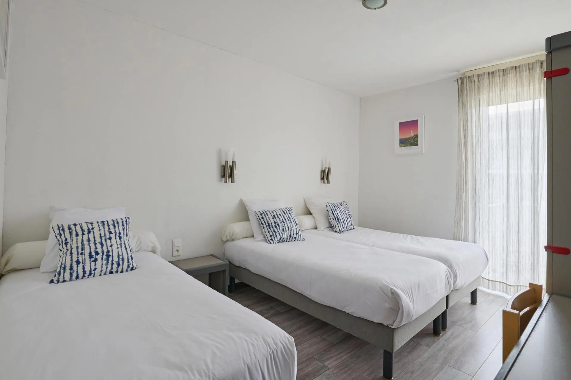 Bedroom in Hôtel Les Mimosas