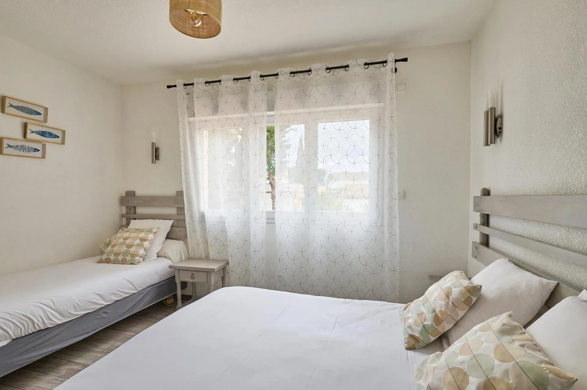 Bedroom in Hôtel Les Mimosas