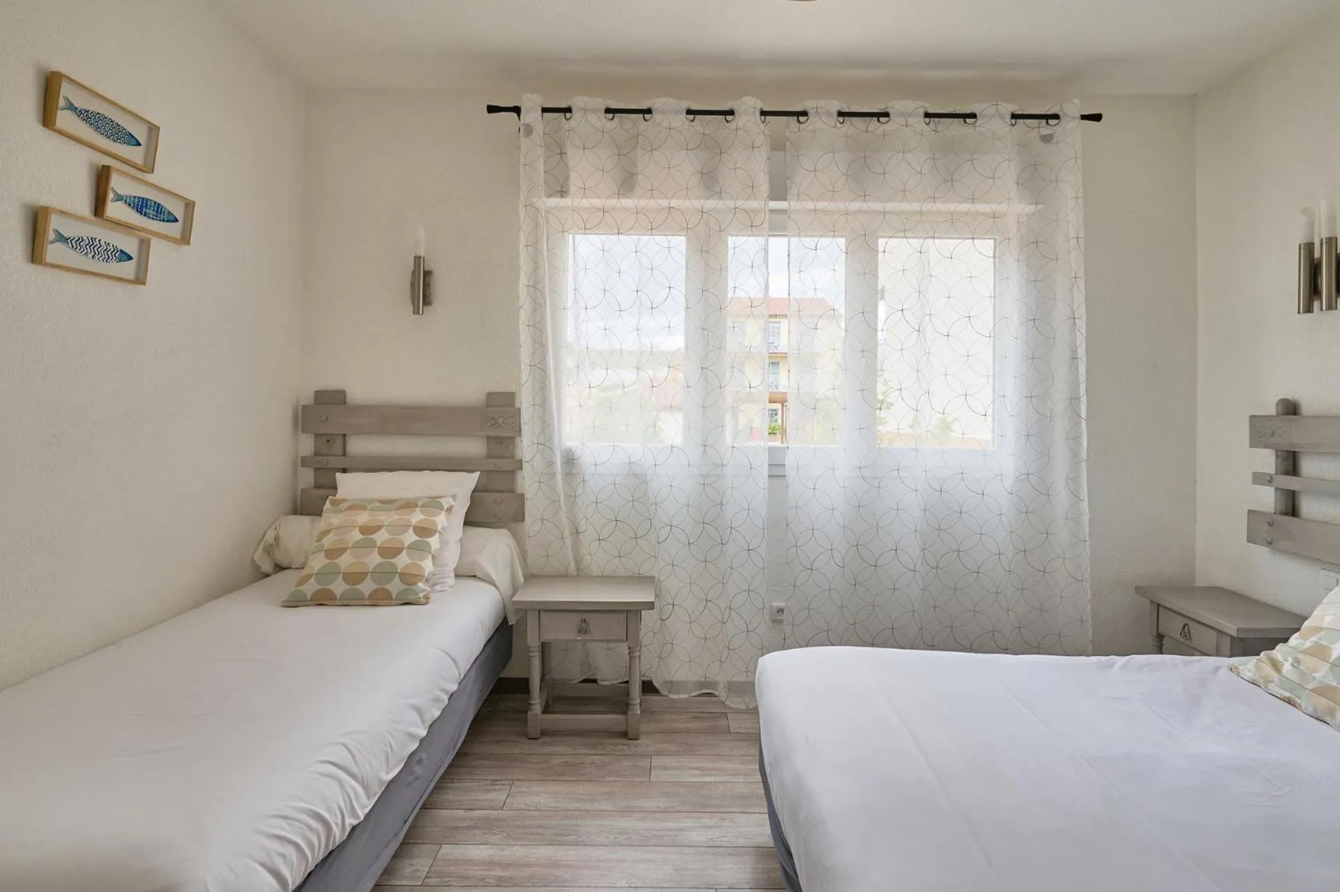 Bedroom in Hôtel Les Mimosas