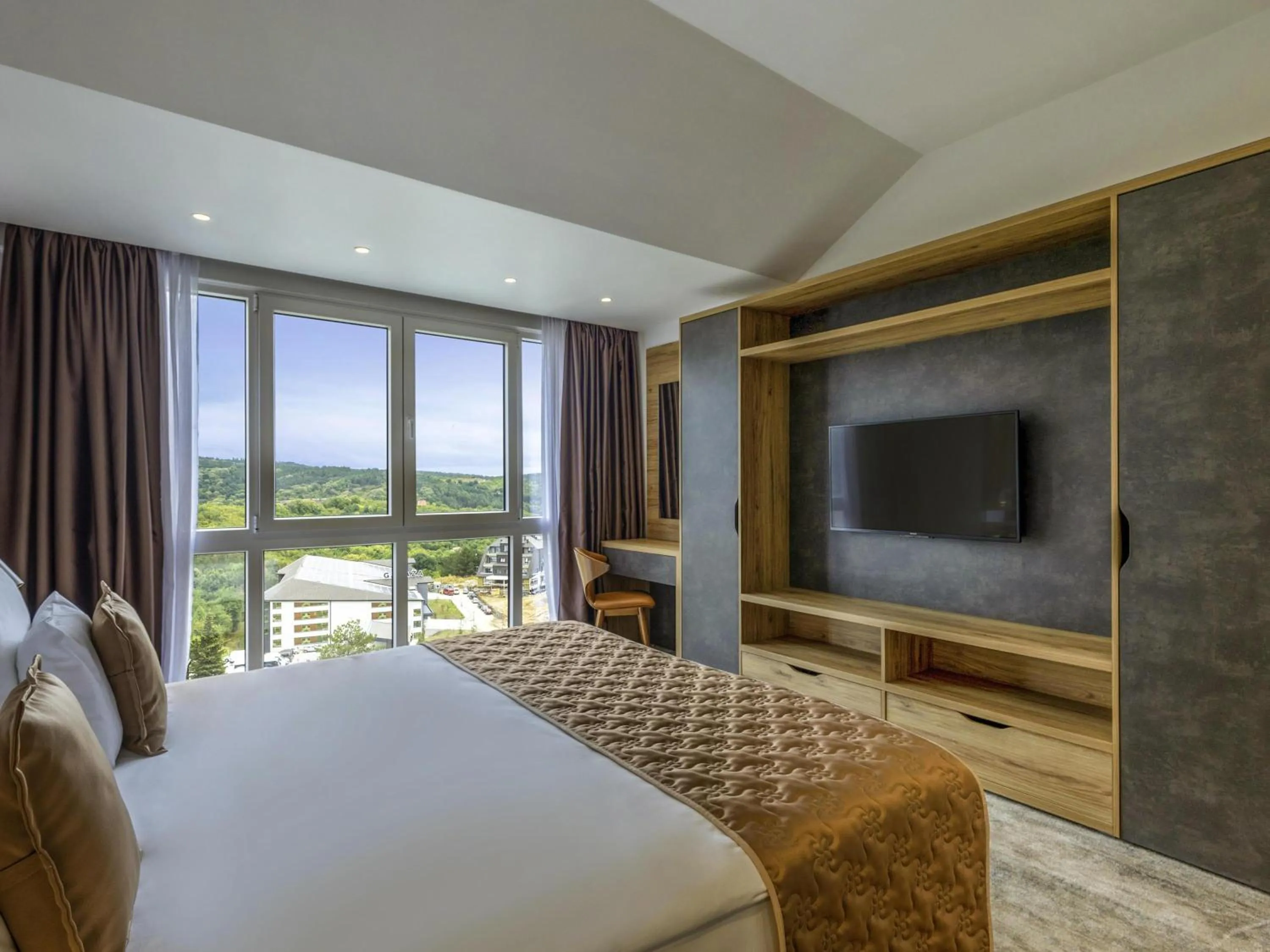 Photo of the whole room, Bed in Movenpick Resort and Spa Fruske Terme