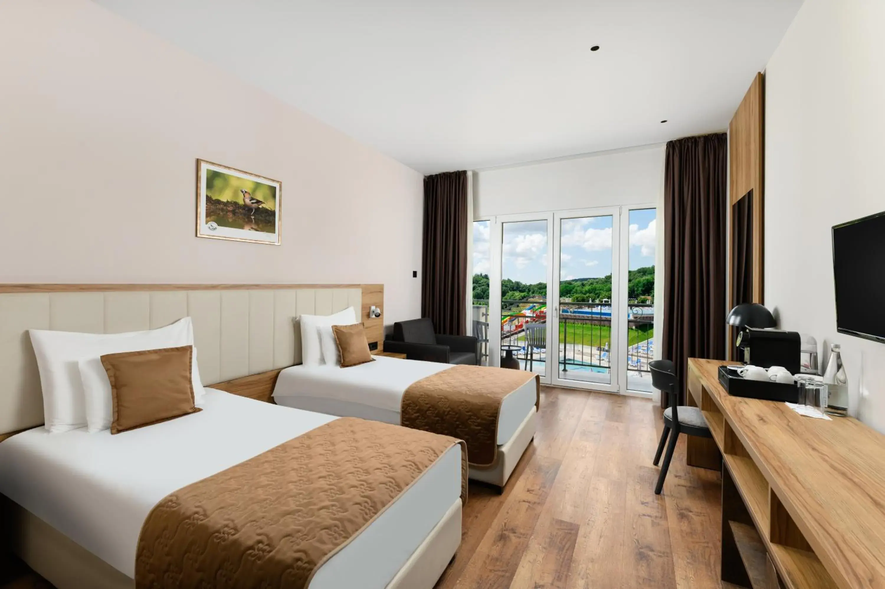 Superior Twin Room with Pool View - single occupancy in Movenpick Resort and Spa Fruske Terme Superior Twin Room with Pool View - single occupancy in Movenpick Resort and Spa Fruske Terme