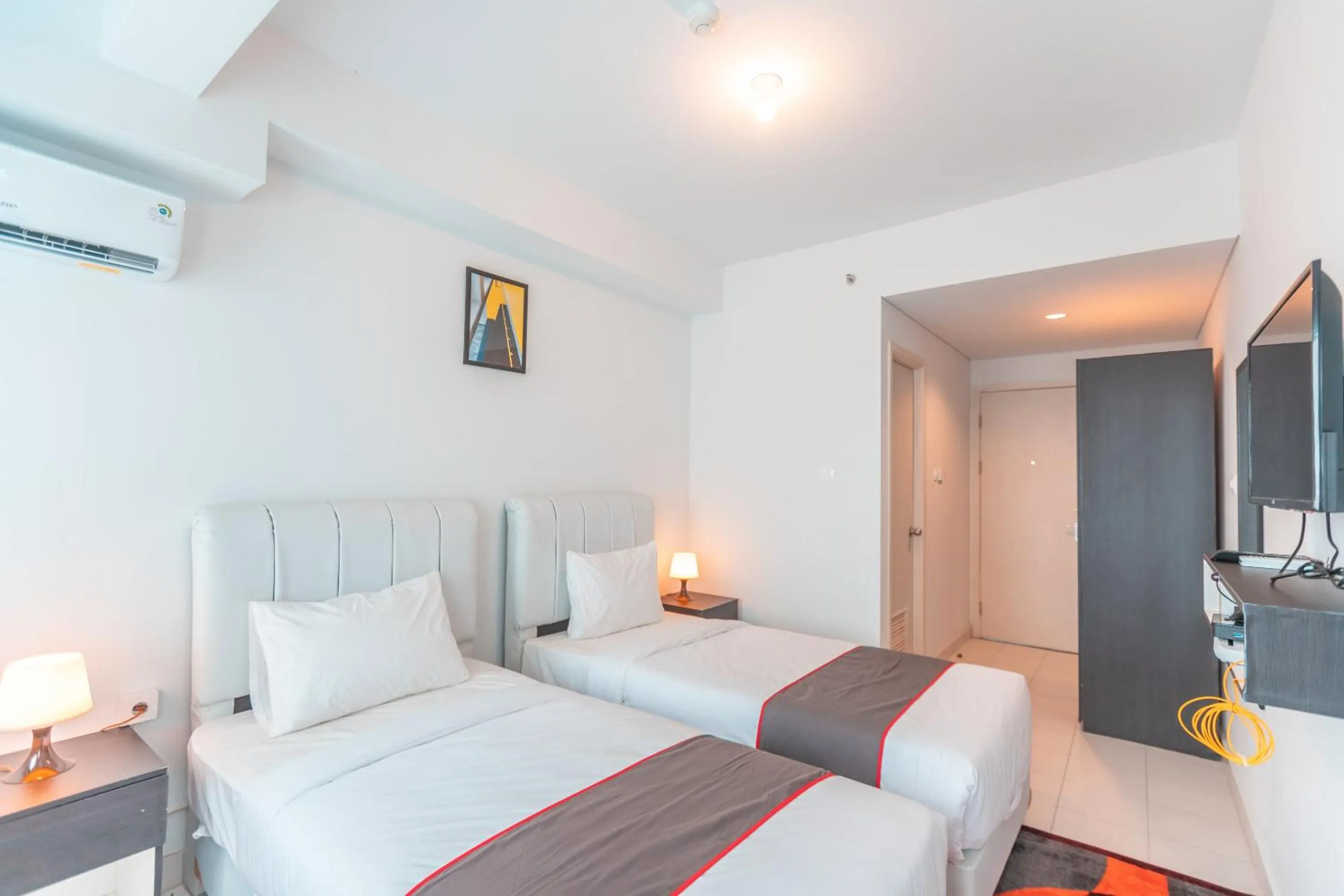 Bedroom in Capital O Urbano