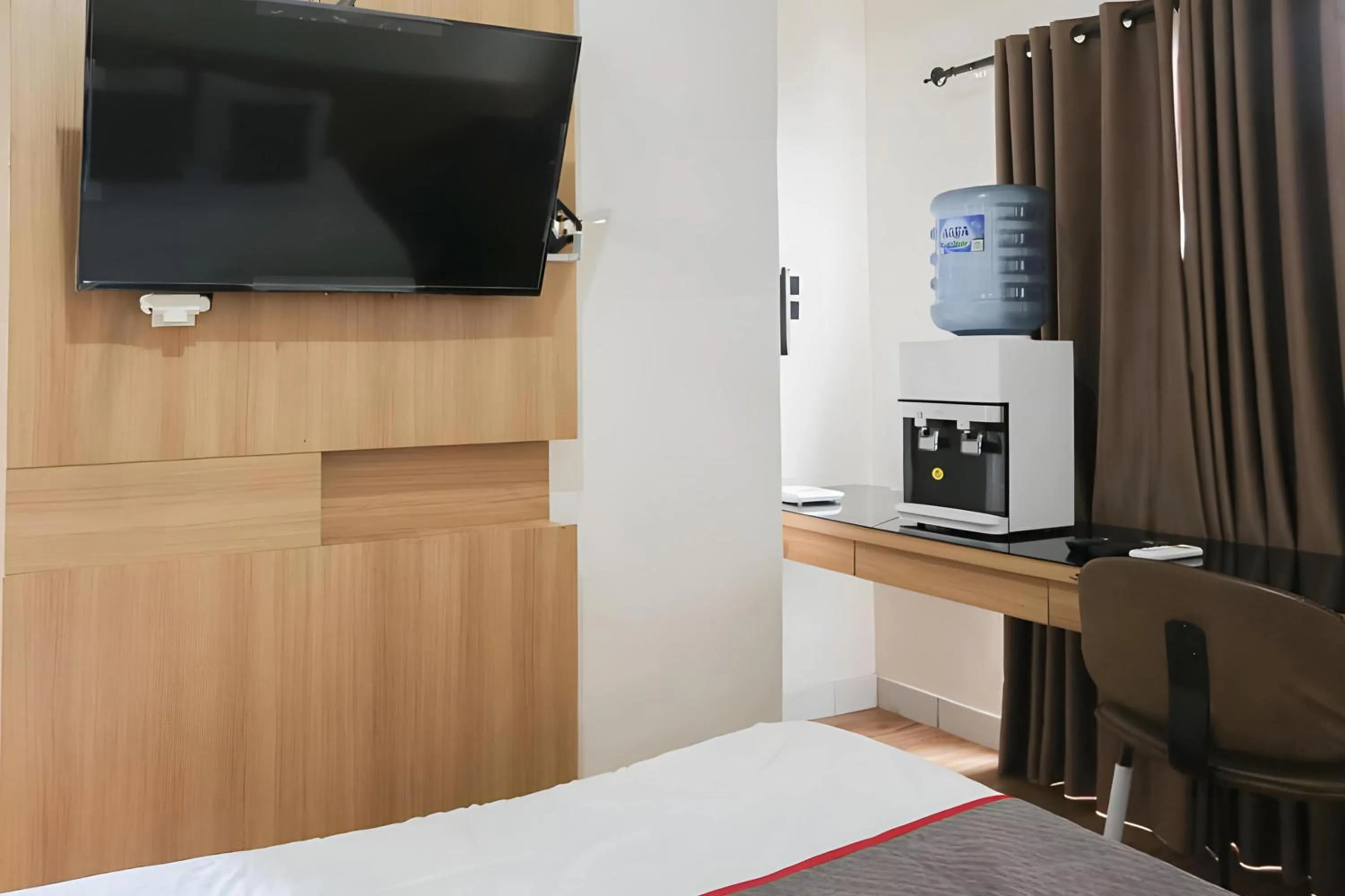 Bedroom in Capital O Urbano