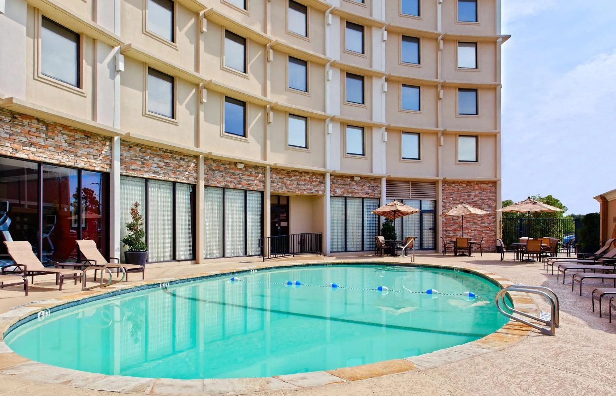 Swimming pool in Holiday Inn Express Dallas Market Center by IHG