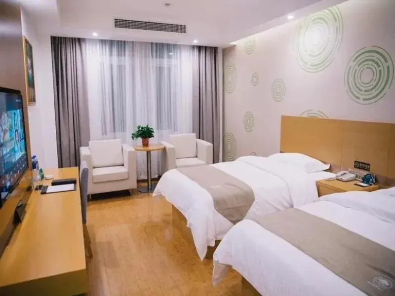 Bed in GreenTree Inn Jinan Jiyang Bus Station Express Hotel Bed in GreenTree Inn Jinan Jiyang Bus Station Express Hotel
