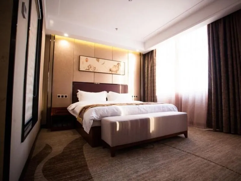 Bed in GreenTree Eastern Bozhou Jingwan Wealth Centre Hotel
