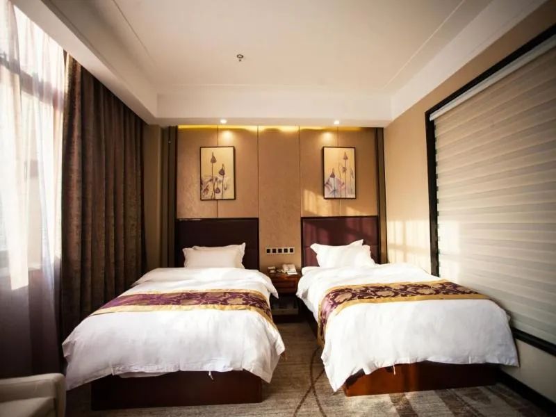 Bed in GreenTree Eastern Bozhou Jingwan Wealth Centre Hotel