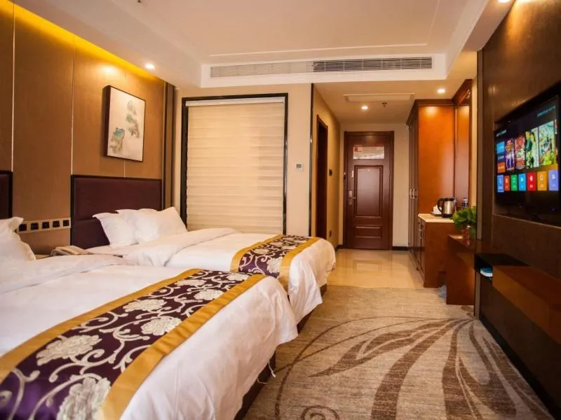 Bed in GreenTree Eastern Bozhou Jingwan Wealth Centre Hotel