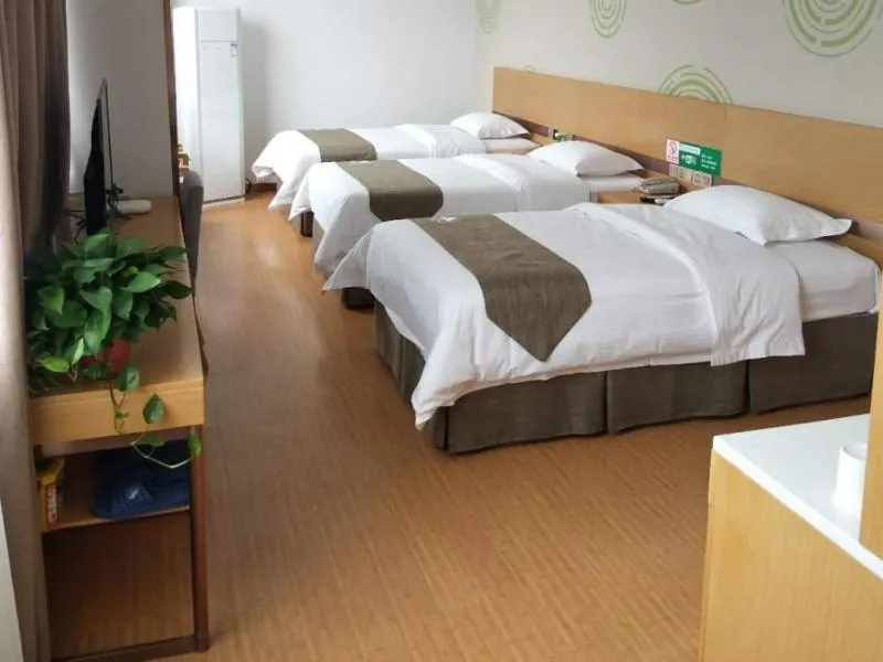 Bed in GreenTree Inn Shangqiu Liangyuan District Suiyang Avenue Hotel