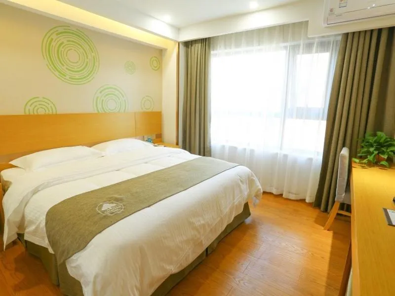 Bed in GreenTree Inn Shangqiu Liangyuan District Suiyang Avenue Hotel