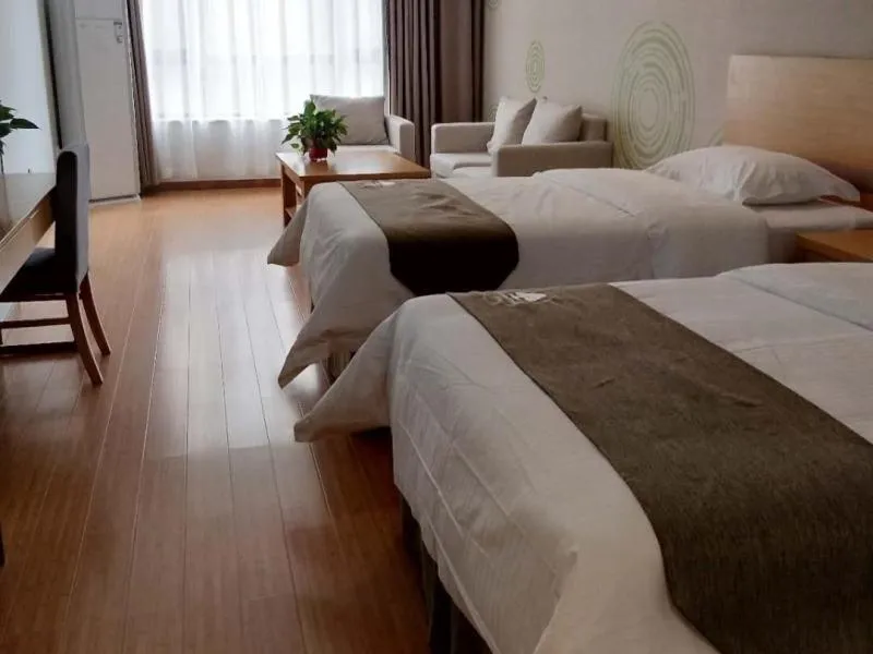 Bed in GreenTree Inn Shangqiu Liangyuan District Suiyang Avenue Hotel